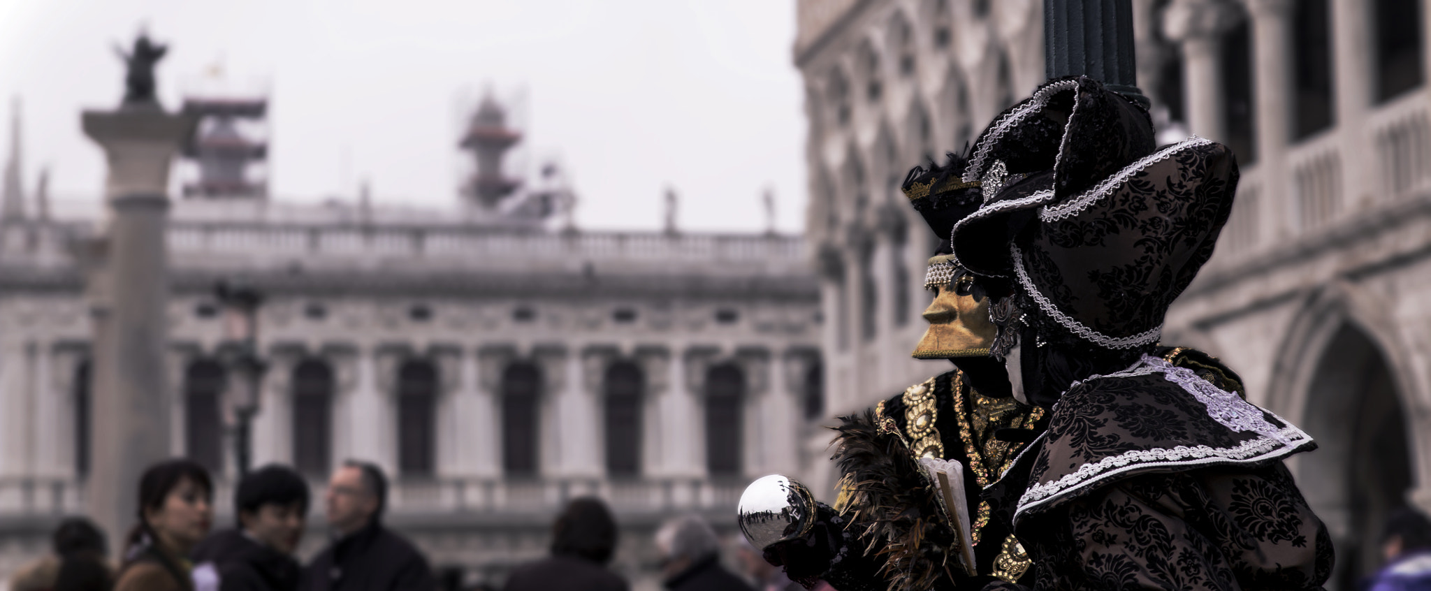 Sigma 24-70mm F2.8 EX DG Macro sample photo. Cinematic view of carnival costumes, venice photography