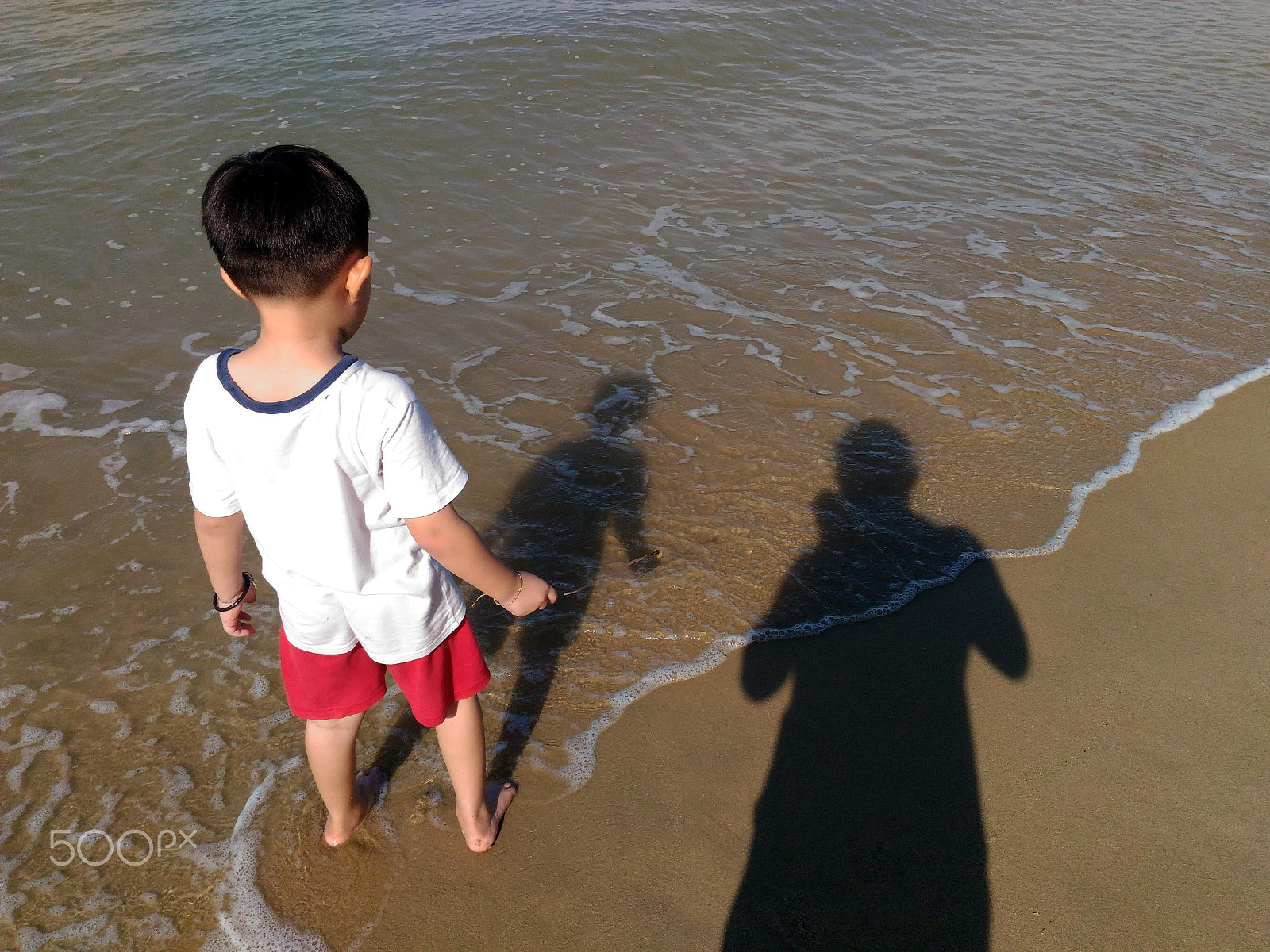 ASUS ZenFone Selfie (ZD551KL) sample photo. Kid playing on beach photography