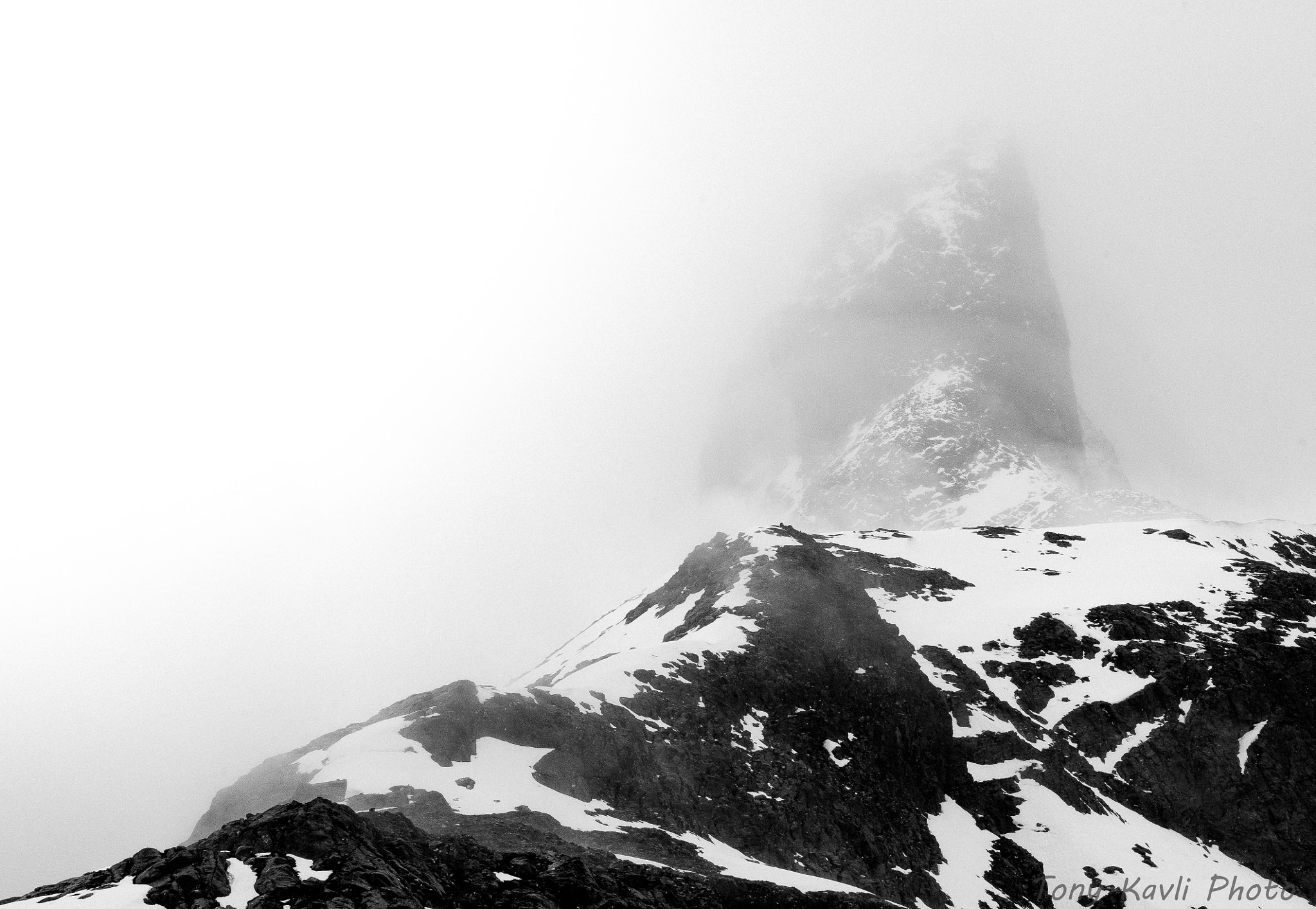 HC 80 sample photo. Romsdalshorn in fog photography