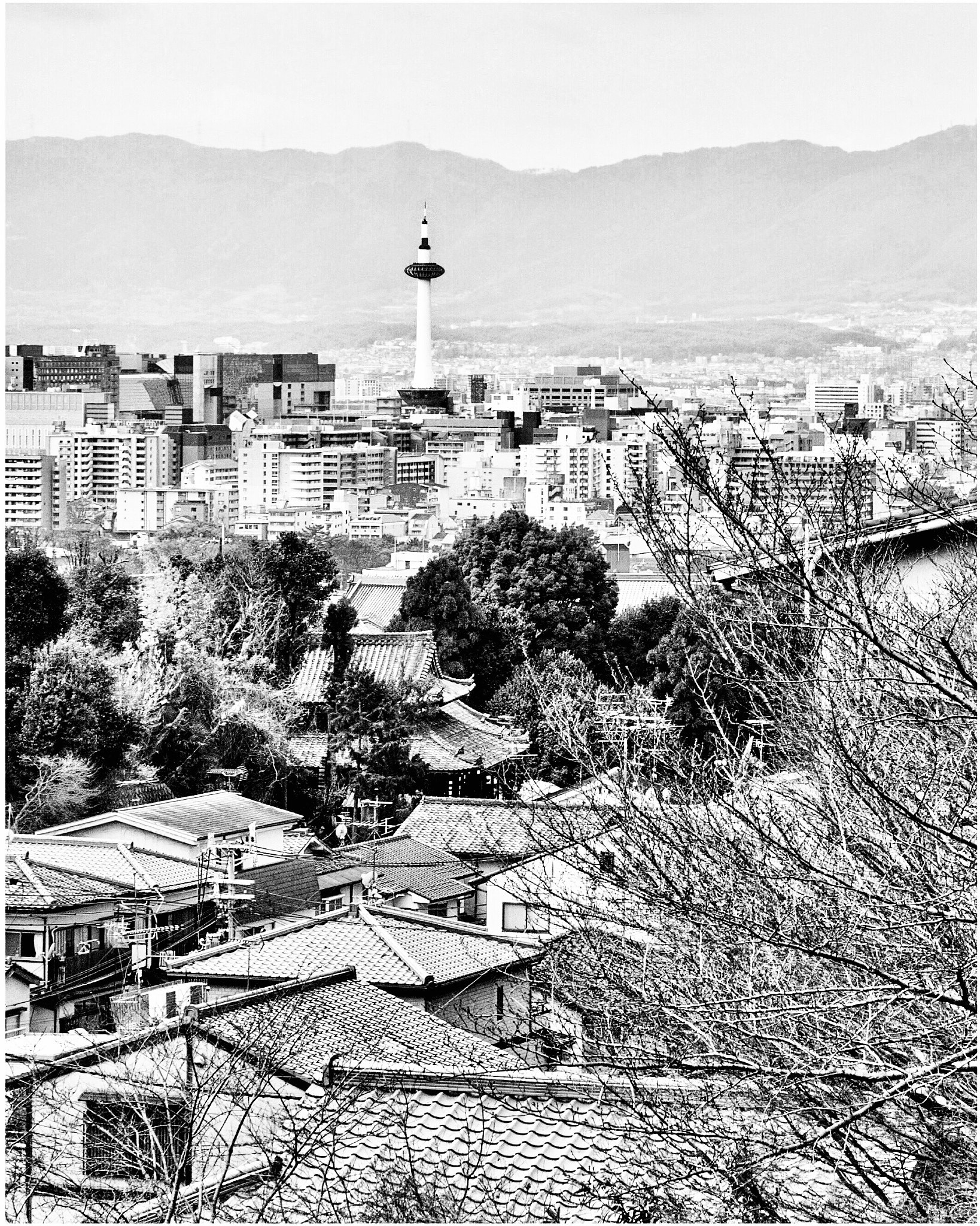 Canon EOS 500D (EOS Rebel T1i / EOS Kiss X3) + Canon EF-S 18-55mm F3.5-5.6 IS sample photo. From kiyomizu temple overlooking city tower of kyoto photography