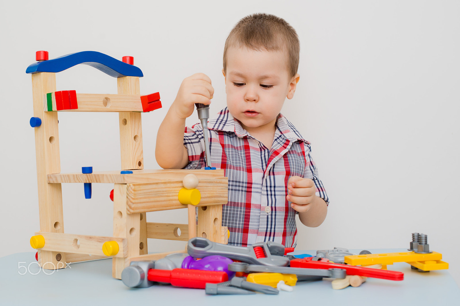 Nikon D800 + Nikon AF Nikkor 50mm F1.4D sample photo. Child playing in tools photography