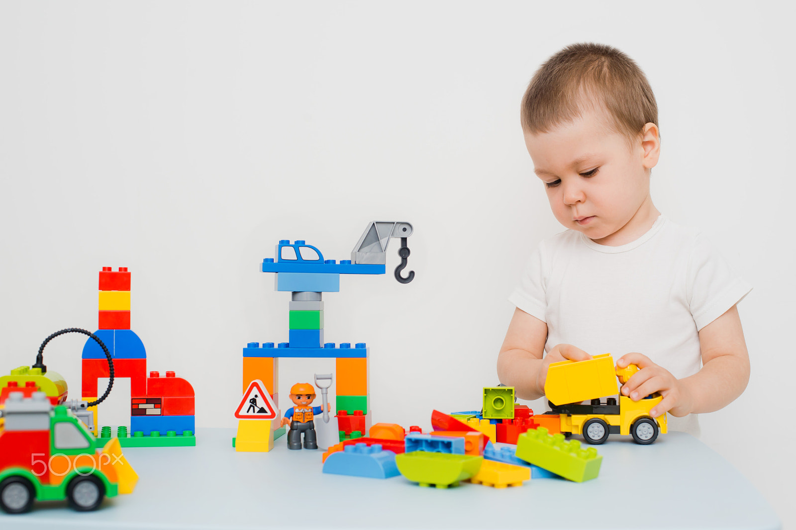 Nikon D800 + Nikon AF Nikkor 50mm F1.4D sample photo. Child playing in the constructor photography