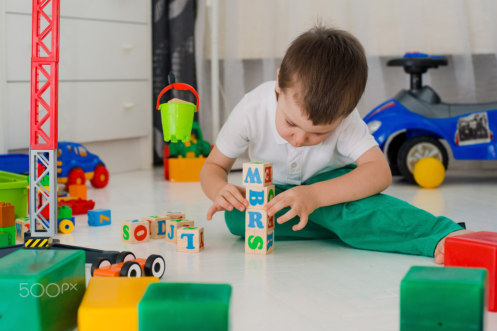 Nikon D800 + Nikon AF Nikkor 50mm F1.4D sample photo. Boy playing with blocks photography