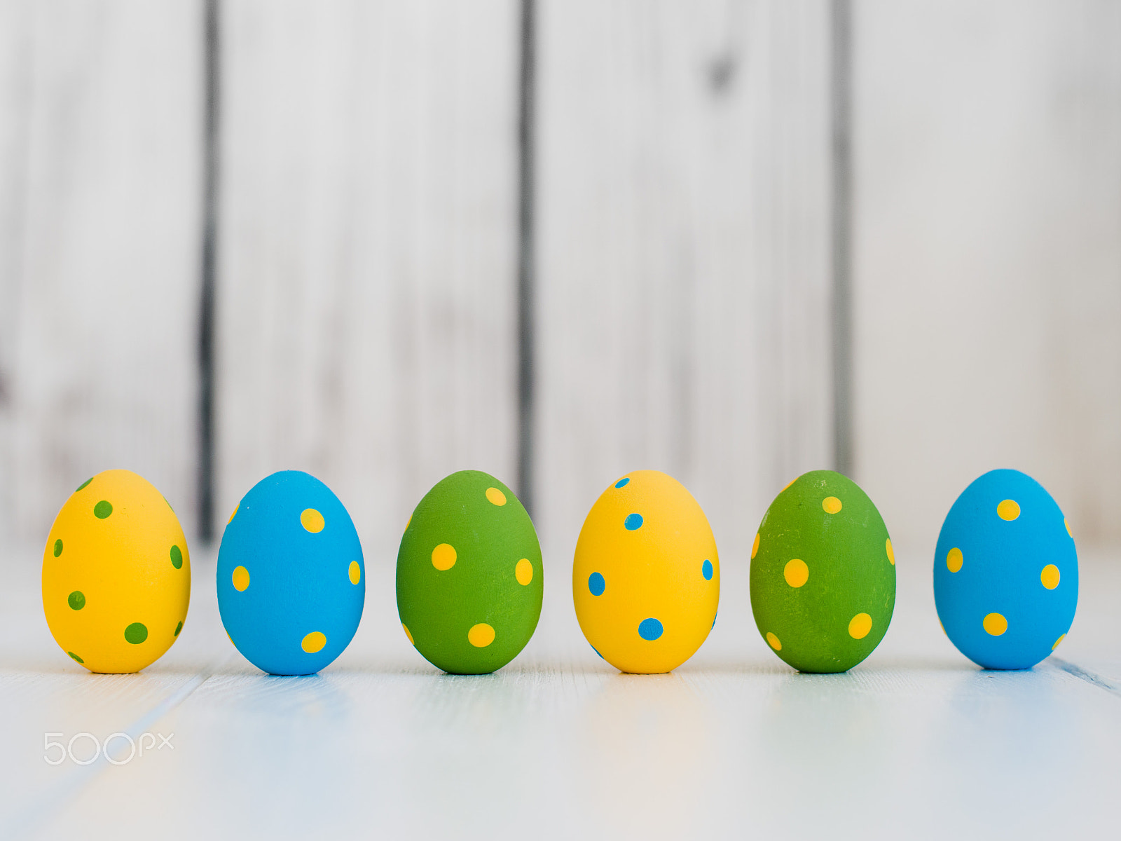 Nikon D800 sample photo. Easter eggs on a white wooden background photography