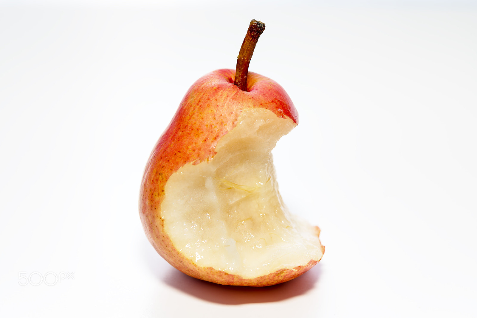 Nikon AF-S Micro-Nikkor 60mm F2.8G ED sample photo. Single pear on a white background photography