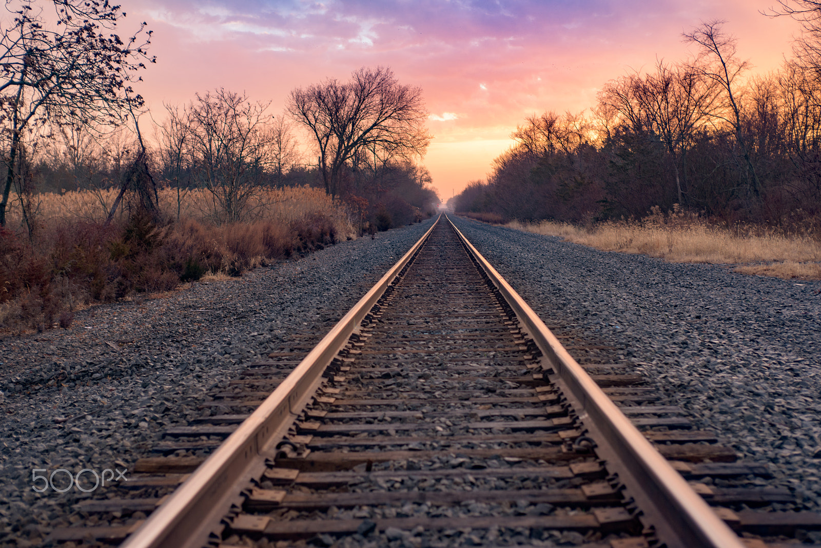 Nikon D810 + AF Zoom-Nikkor 35-70mm f/2.8D sample photo. Rail tracks at sunrise photography