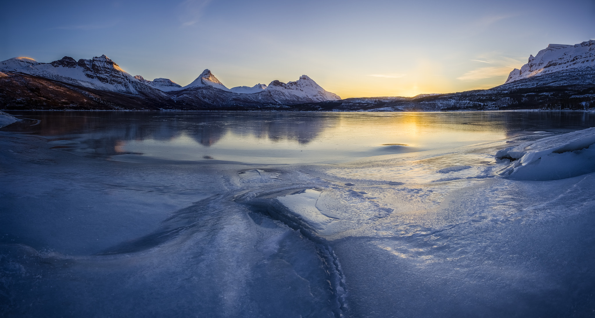 Olympus OM-D E-M1 Mark II + OLYMPUS M.12mm F2.0 sample photo. Sunrise over the frozen fjord photography
