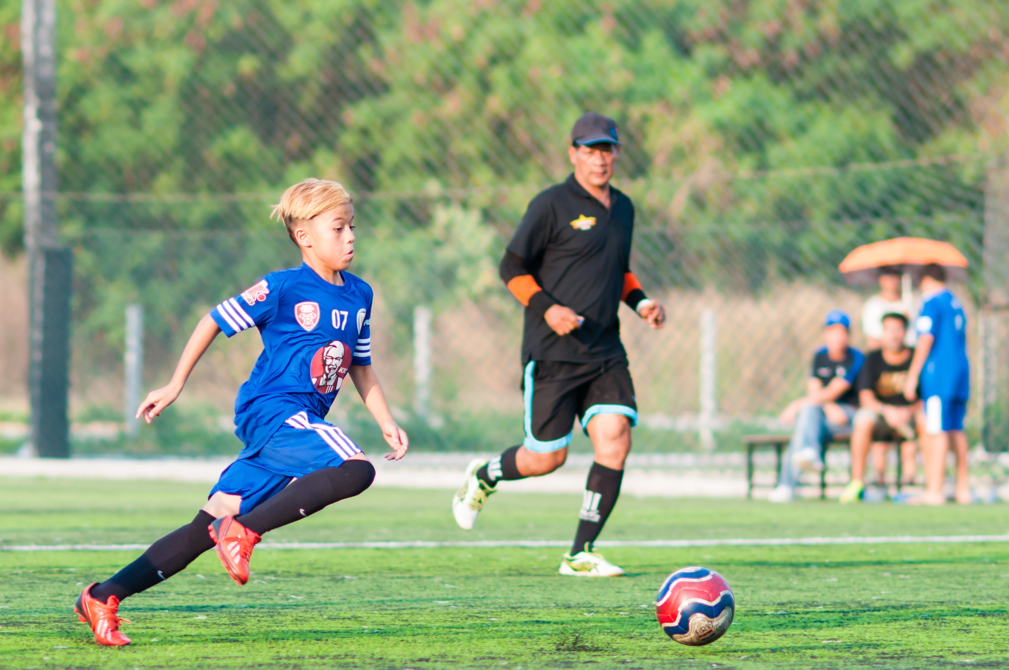 Nikon D300 + AF DC-Nikkor 135mm f/2D sample photo. Bangkok,thailand:february 25 2017:primary school tournament.football friendly match for student... photography