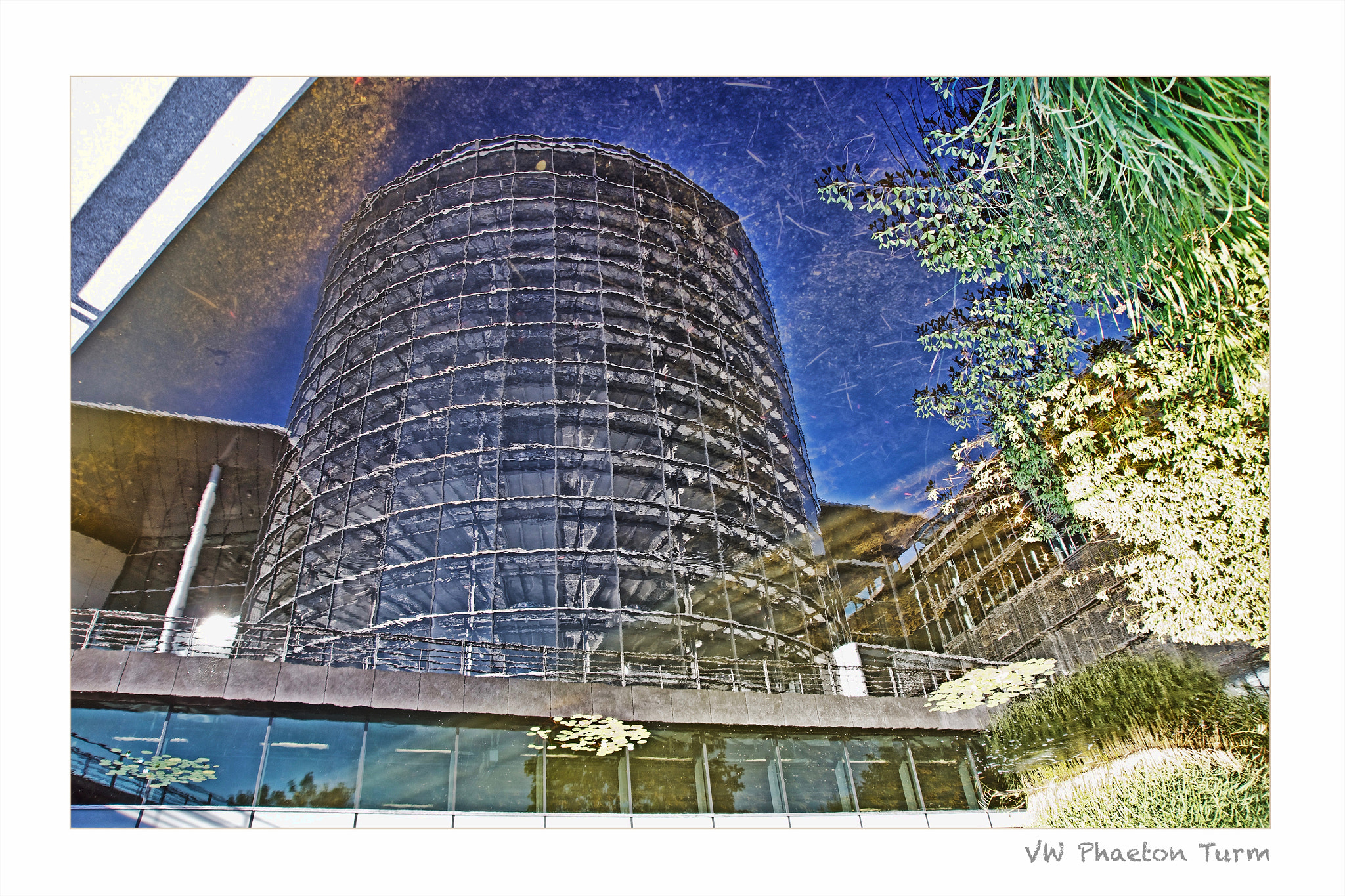 Sony SLT-A55 (SLT-A55V) sample photo. Vw phaeton tower's mirrored image photography