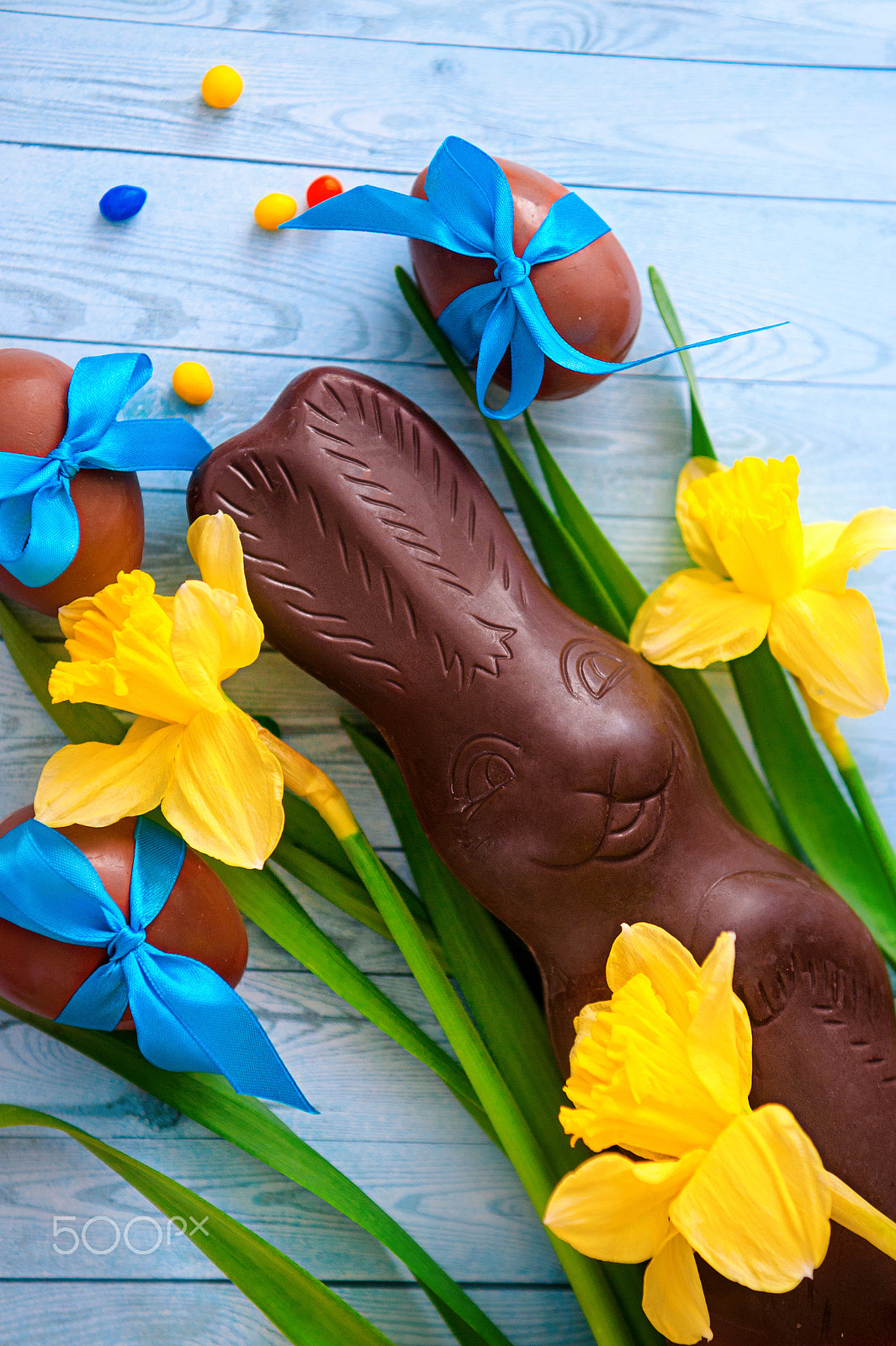 Nikon D700 sample photo. Milk chocolate easter eggs, narcissus and rabbit. festive composition photography