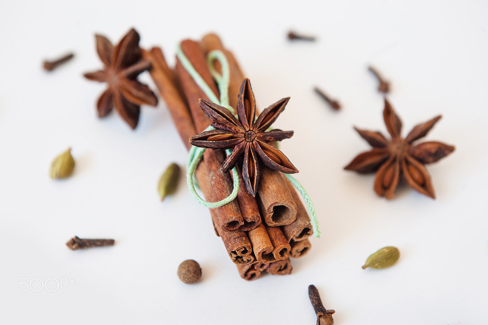 Nikon D700 sample photo. Star anise and cinnamon on white background photography
