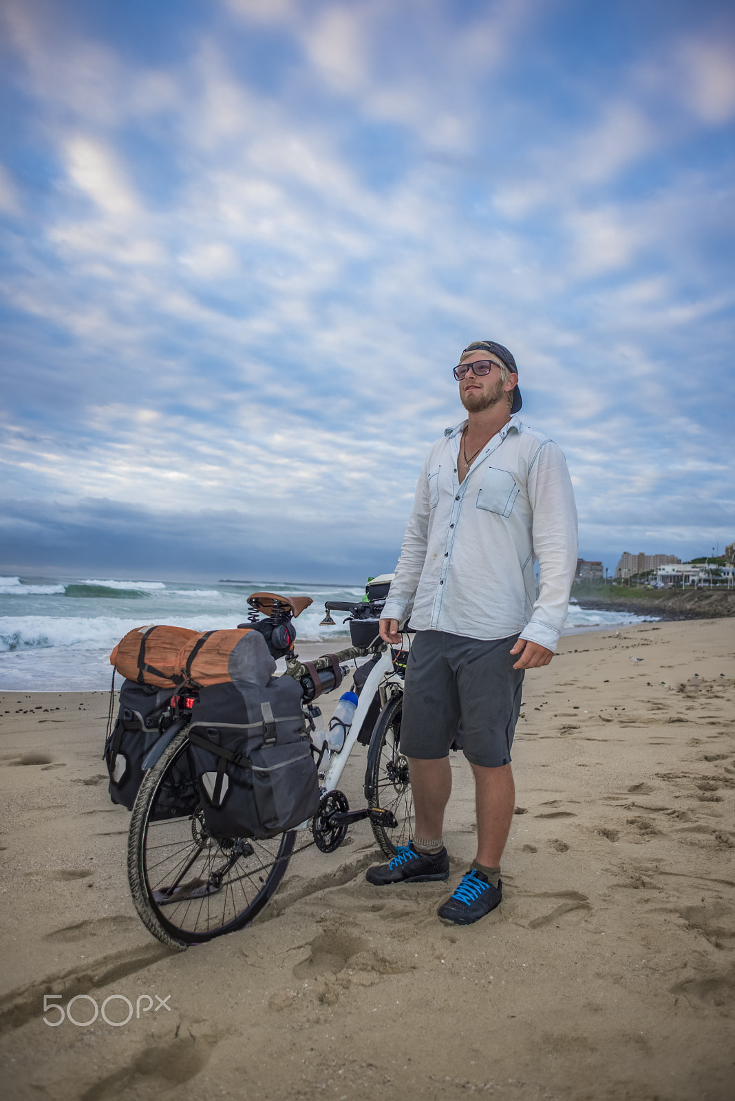 Nikon D600 + Nikon AF Nikkor 24mm F2.8D sample photo. Cycle packer on beach with bicycle photography