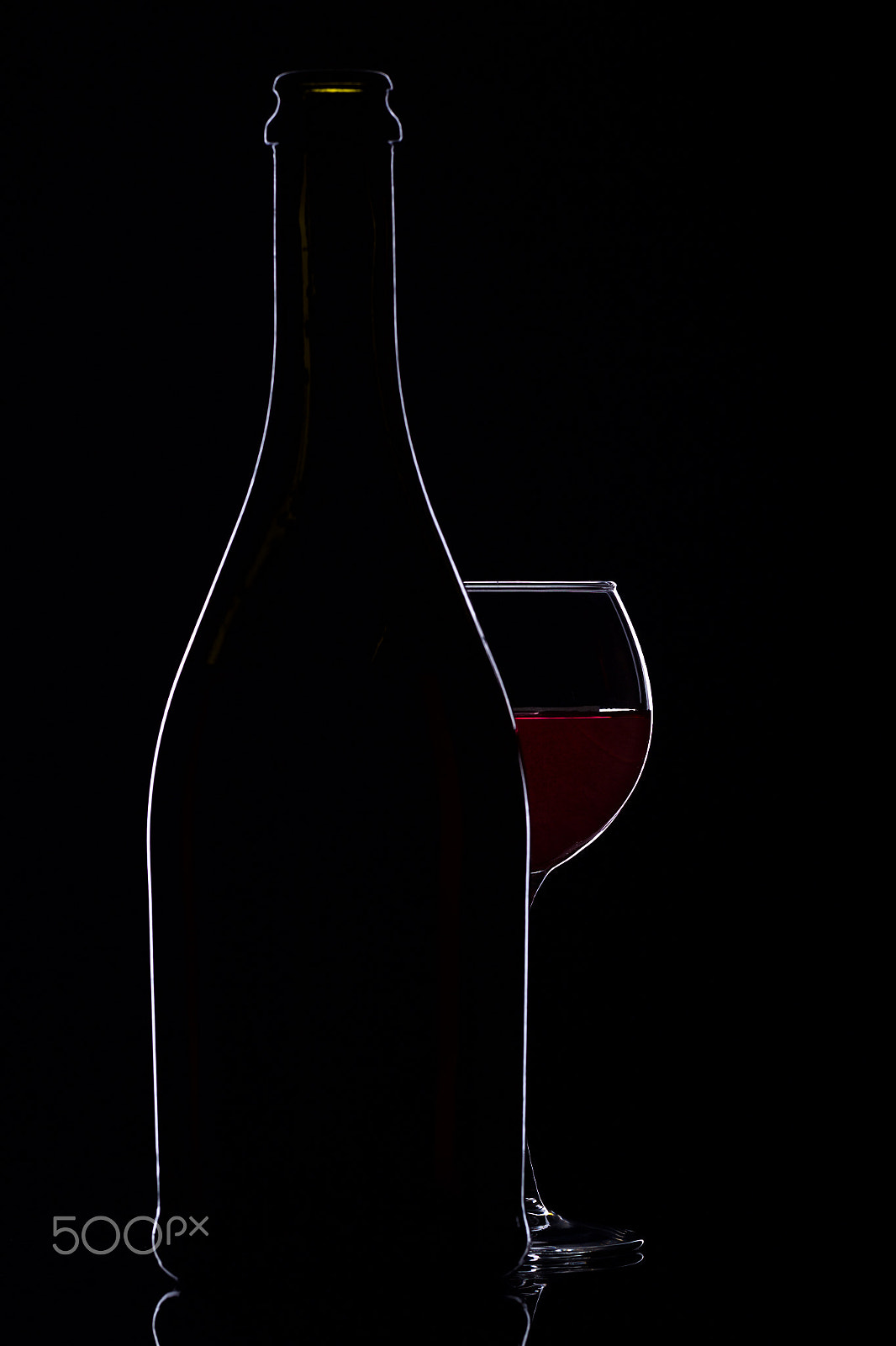 Canon EOS-1D Mark IV + Canon EF 100mm F2.8L Macro IS USM sample photo. Wine glasses with wine bottle on a black background, minimalism, photography