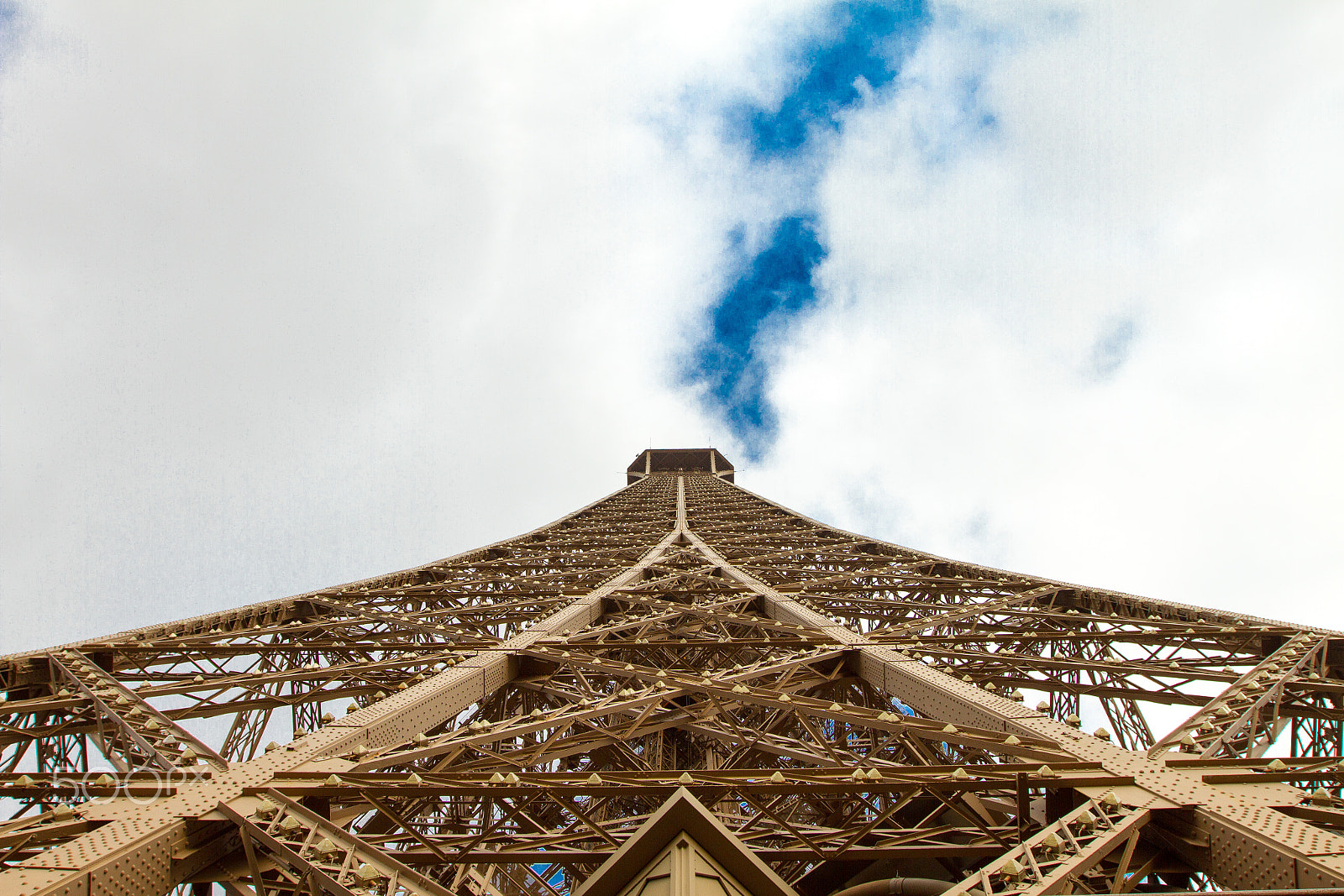 Canon EOS 7D + Canon EF 16-35mm F2.8L II USM sample photo. View looking up the eiffel tower, paris photography
