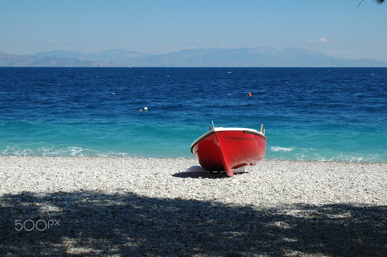 Nikon D70 sample photo. Red boat and hues of blue photography