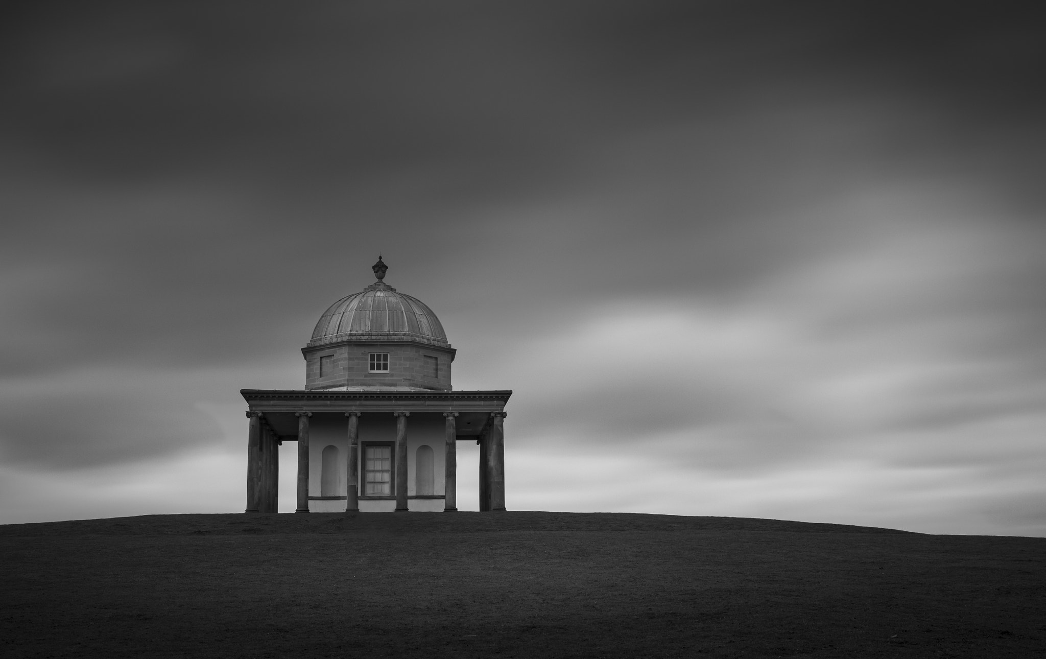 Canon EF 16-35mm F4L IS USM sample photo. Standing alone in mono photography