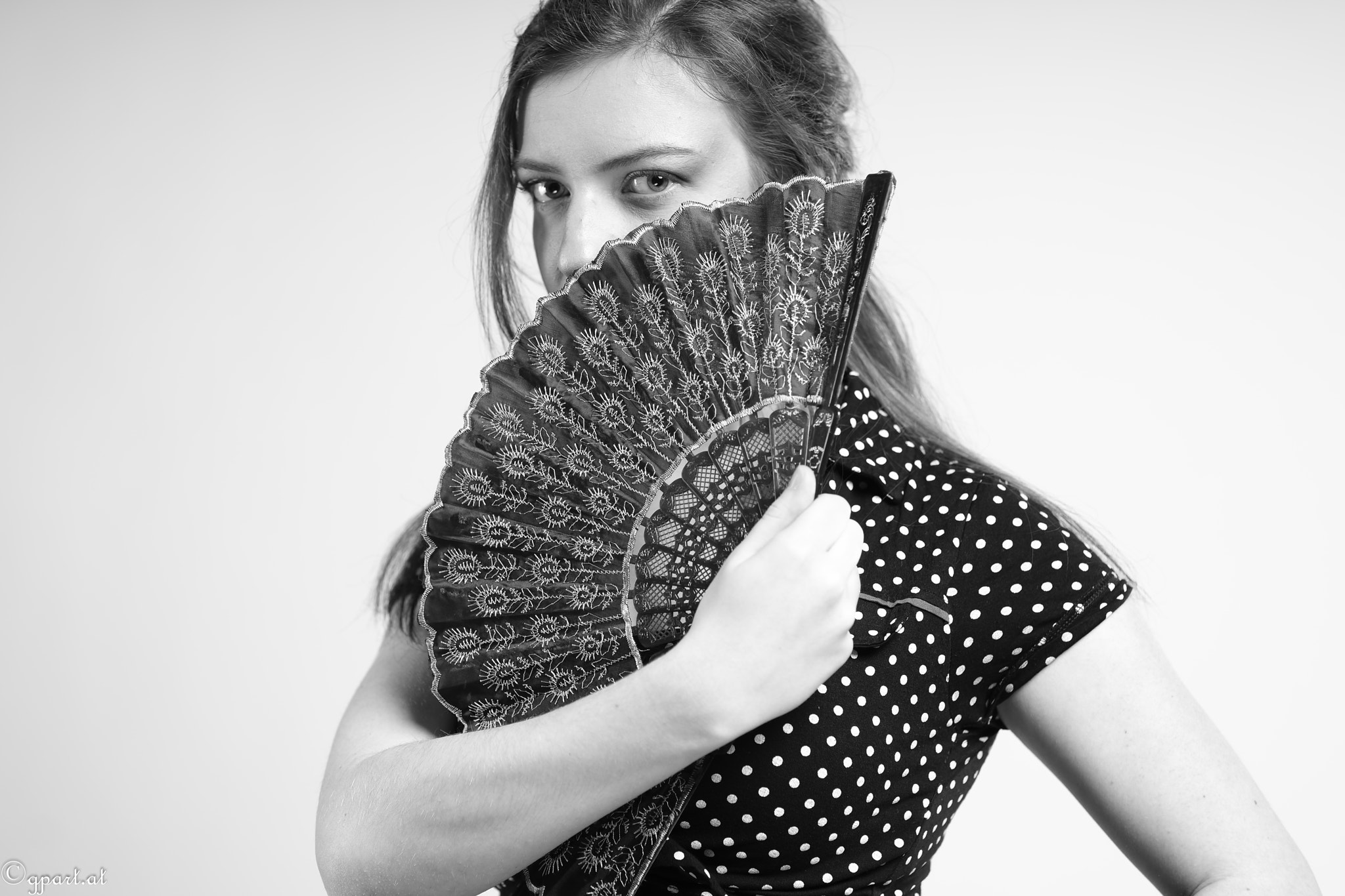 Sony a99 II + 85mm F1.4 sample photo. B & w veronika - behind a fan ii photography