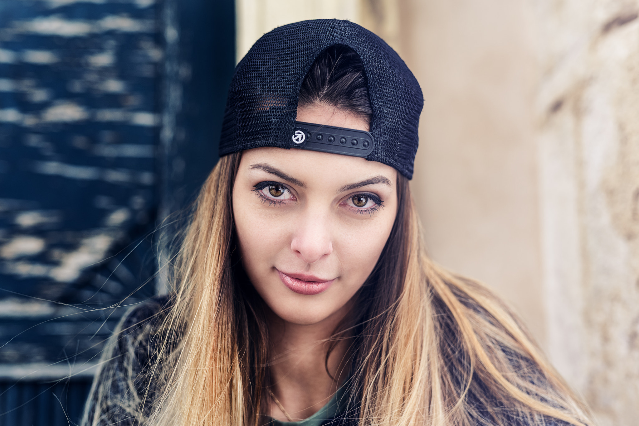 Sigma 50mm F1.4 DG HSM Art sample photo. Woman and baseball cap photography