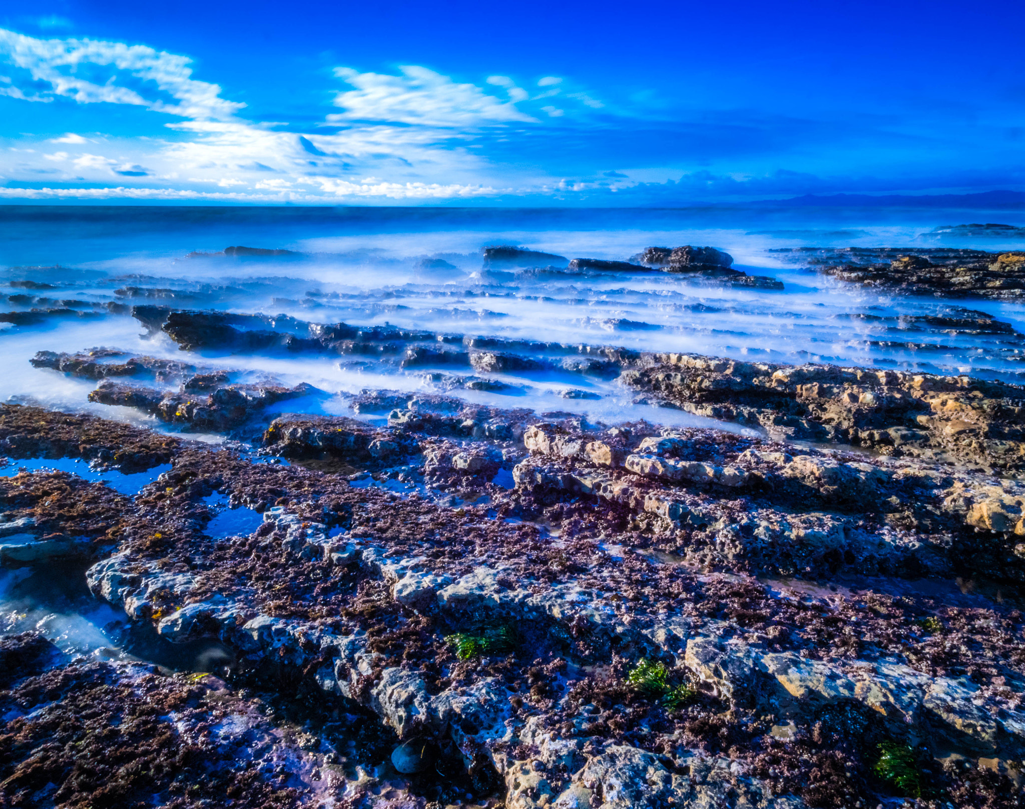 Olympus OM-D E-M1 sample photo. Clouds and tidepool photography