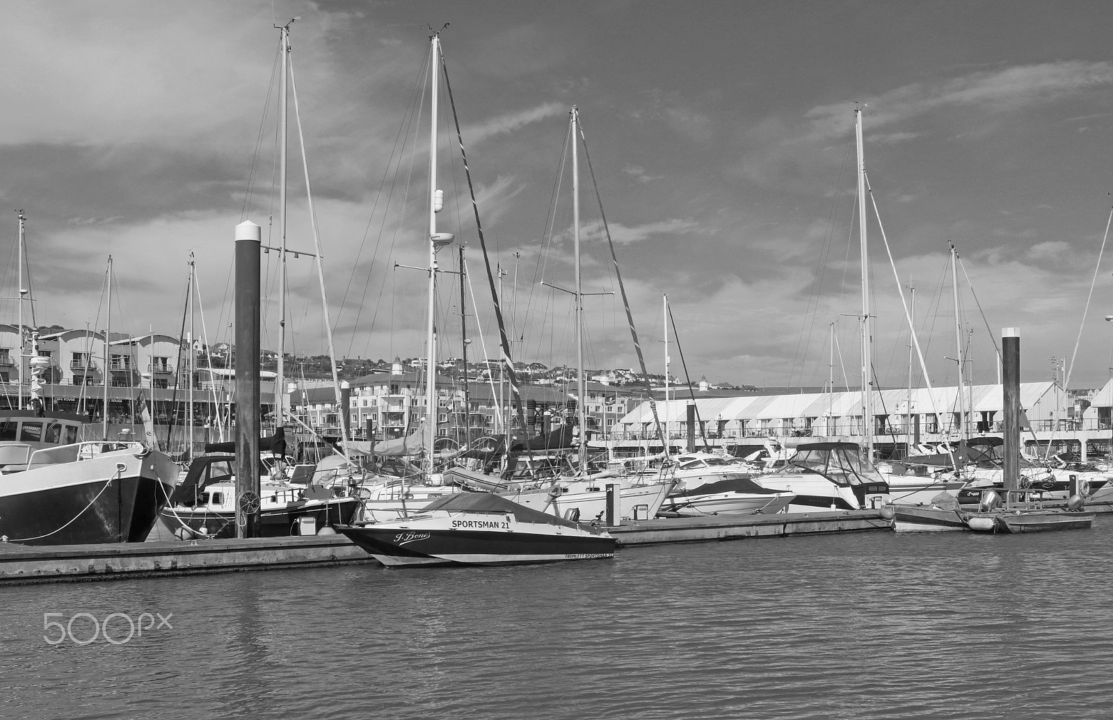 Canon EF-S 24mm F2.8 STM sample photo. Boats at harbour balck and white photography