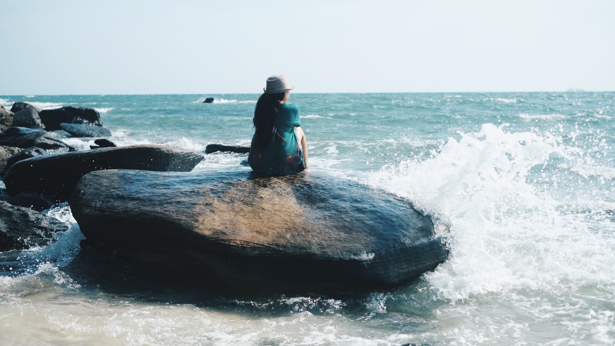 Fujifilm X-Pro1 sample photo. My sister looking at the sea photography