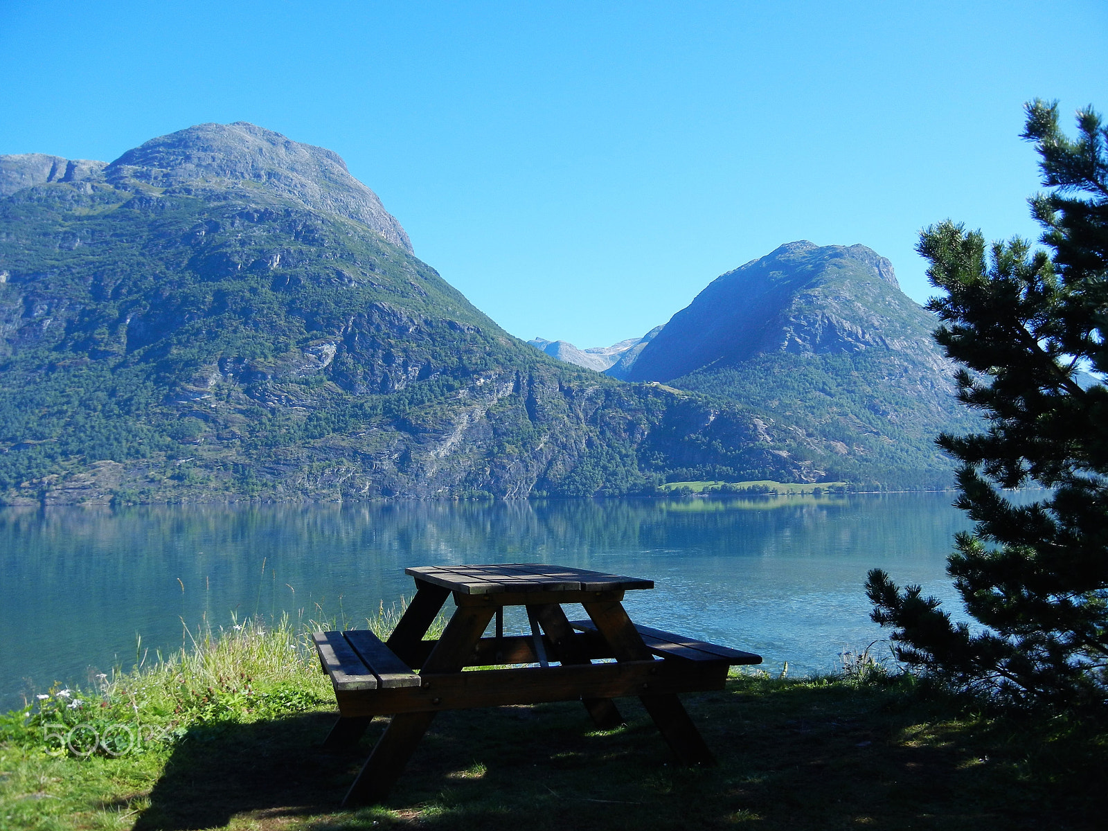 Nikon Coolpix S8100 sample photo. A bench with a view photography