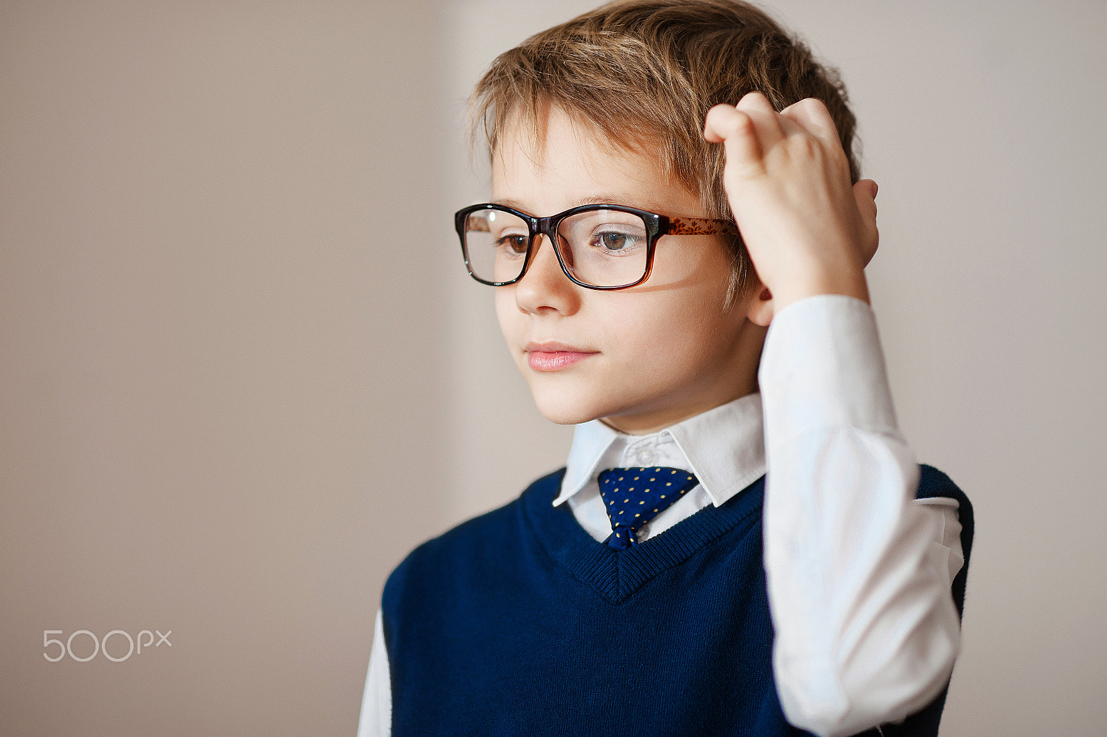 Nikon D700 + Nikon AF Nikkor 85mm F1.8D sample photo. Thinking child portrait of a little boy age seven in glasses  deeply about something looking up... photography