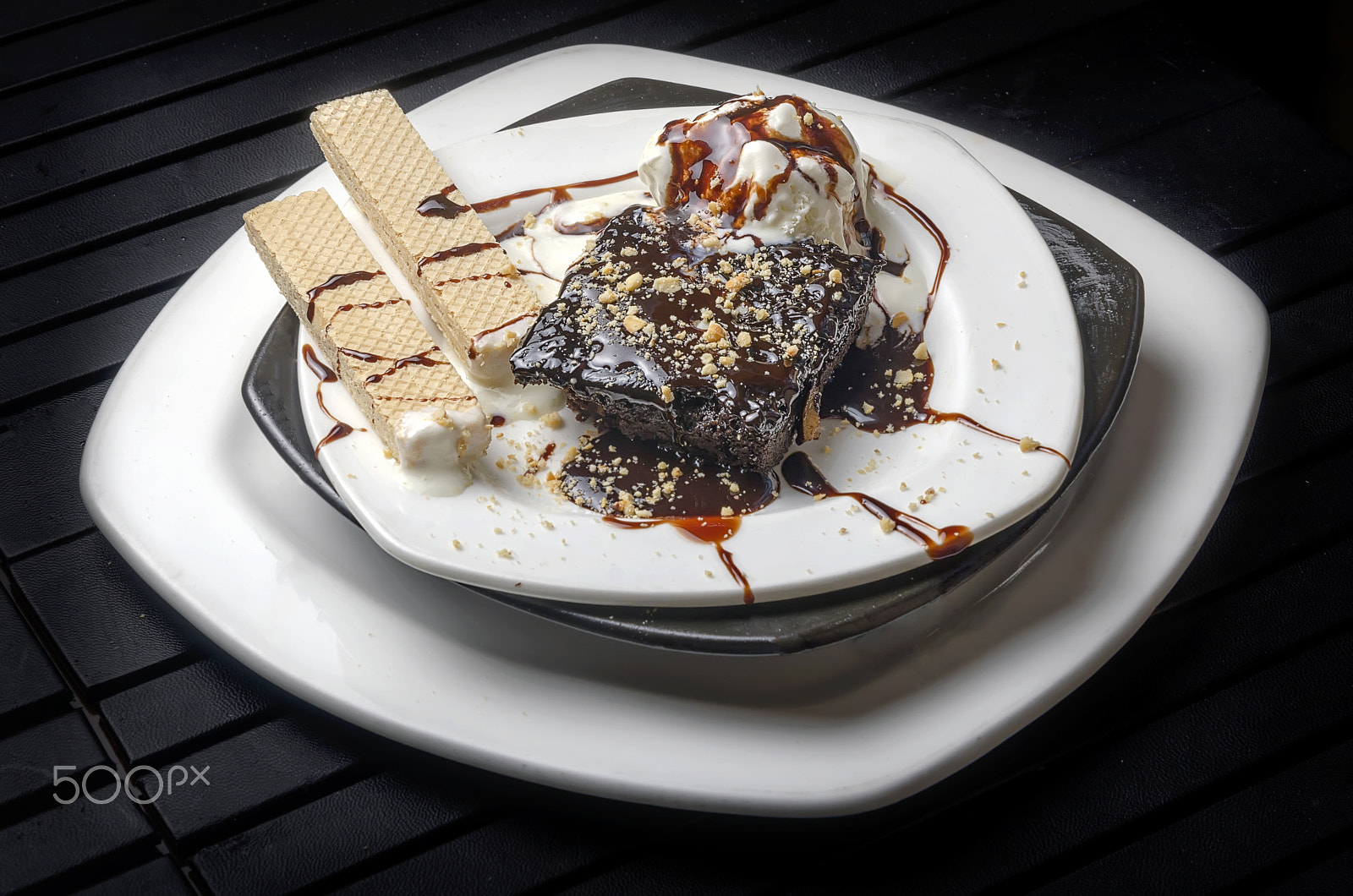 Nikon D7000 sample photo. Brownie with vanilla ice cream and chocolate sauce photography