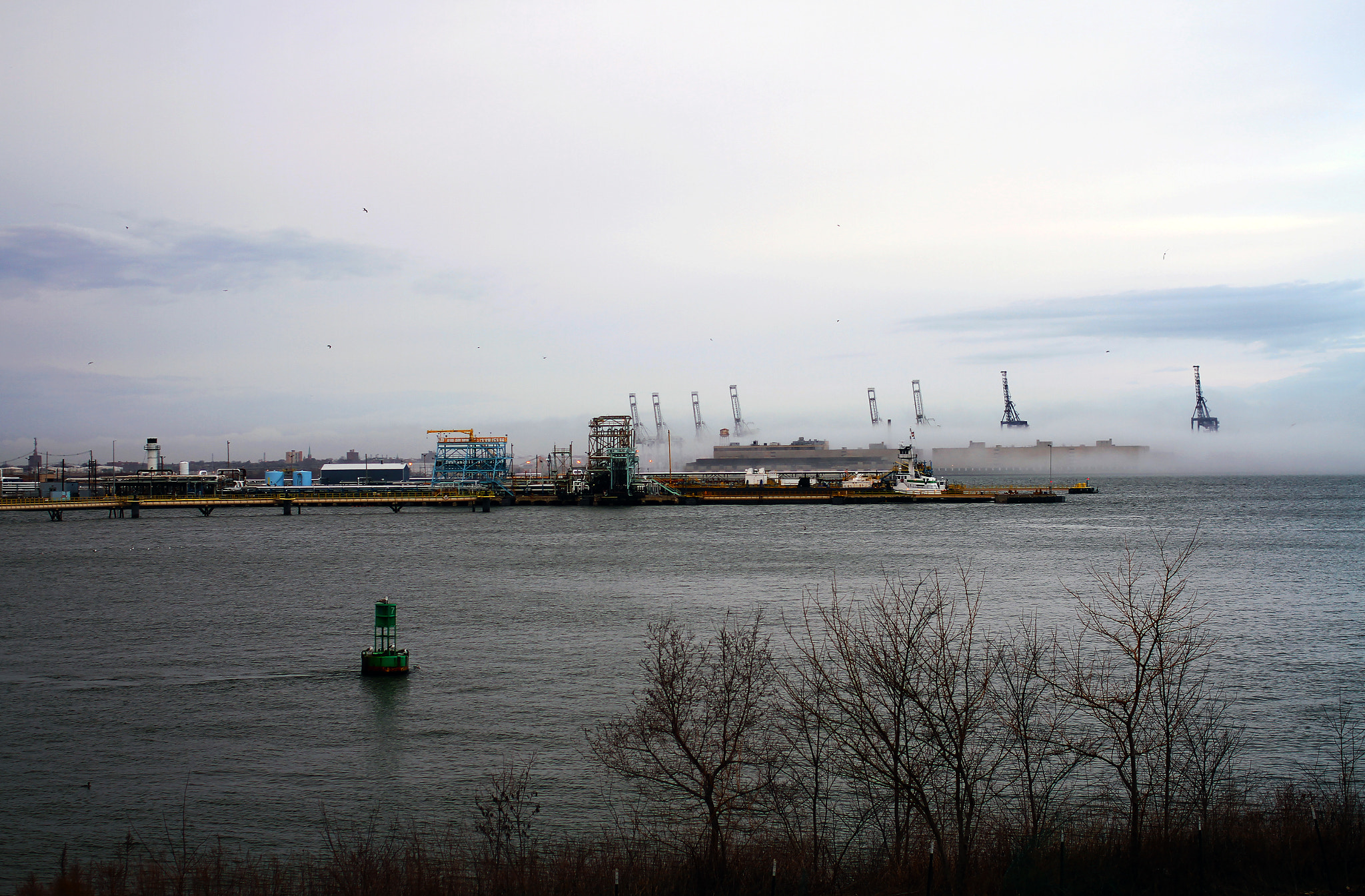 Canon EOS 7D + Canon EF 35mm F2 sample photo. Cloudy new york harbor photography