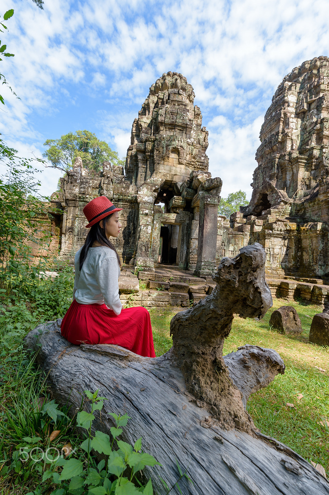 Nikon D4S sample photo. A woman looks at the old temples photography