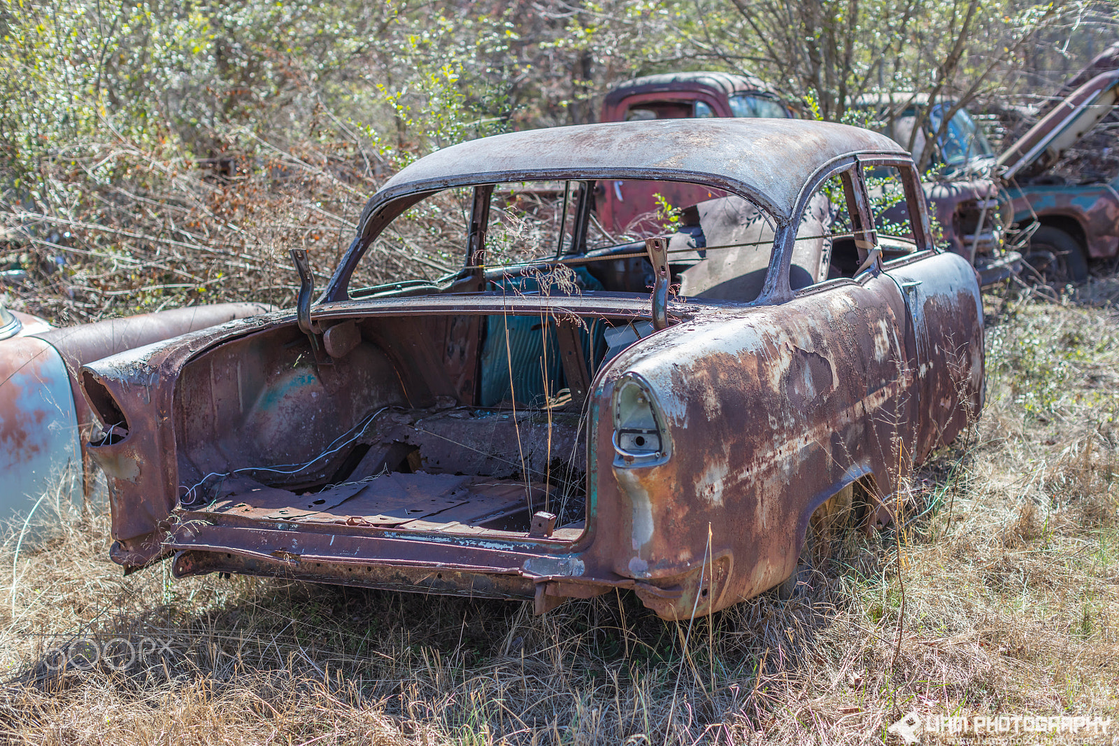Canon EF 50mm F1.2L USM sample photo. Rusty husk of a chevy photography