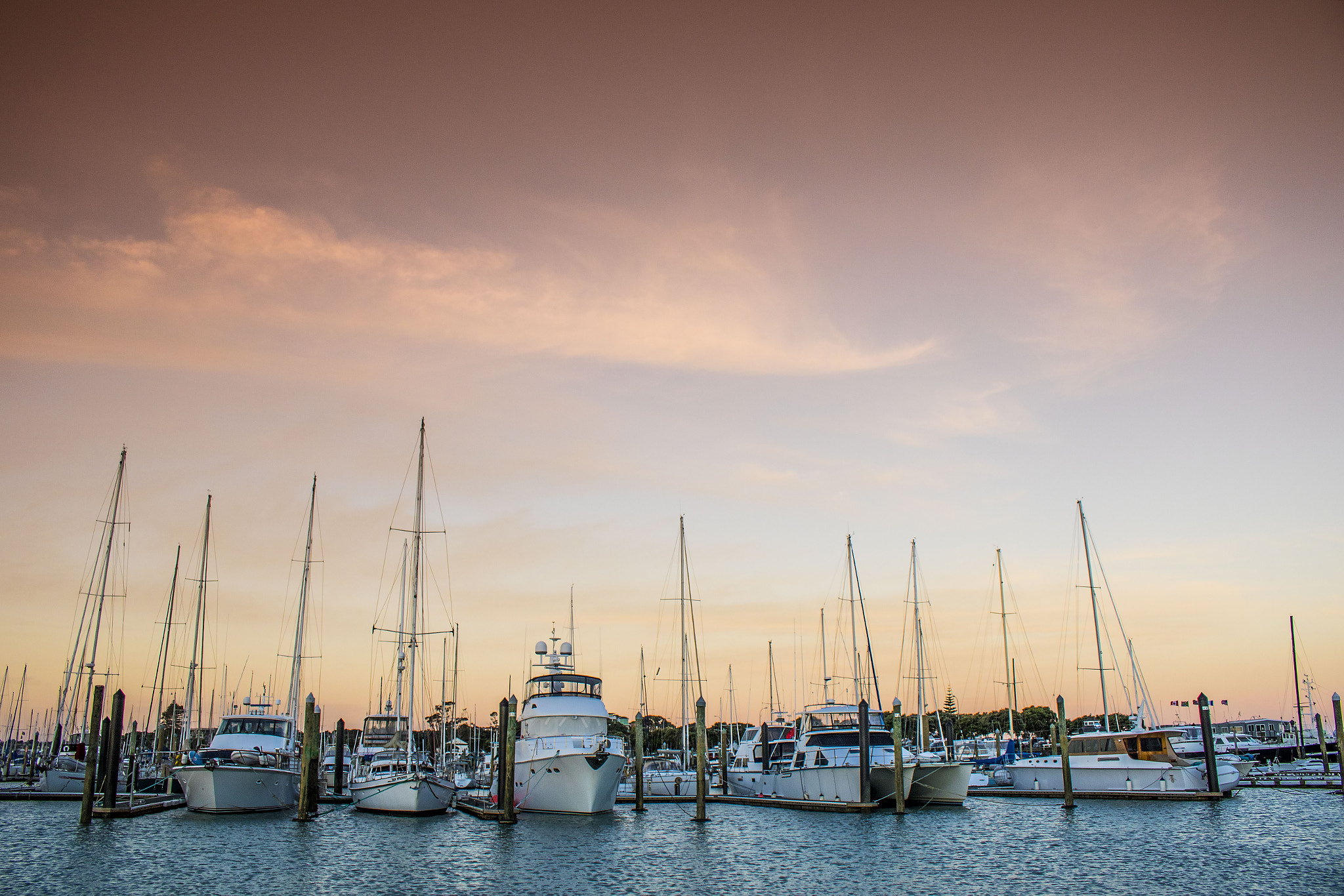 Canon EOS 7D Mark II + Canon EF-S 18-55mm F3.5-5.6 IS STM sample photo. Sunset boats photography
