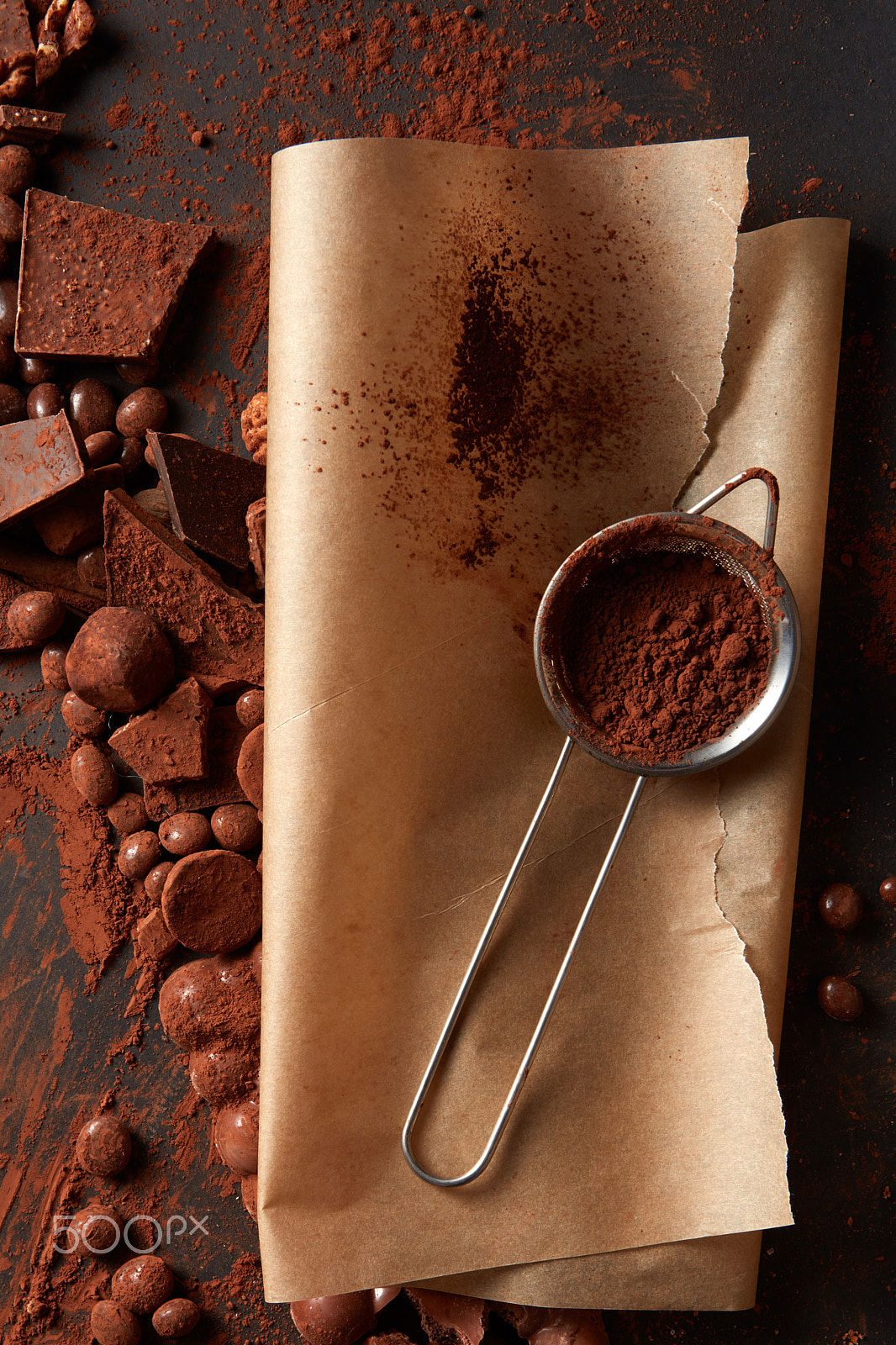 Canon EF 24-70mm F2.8L USM sample photo. Cocoa powder on parchment photography