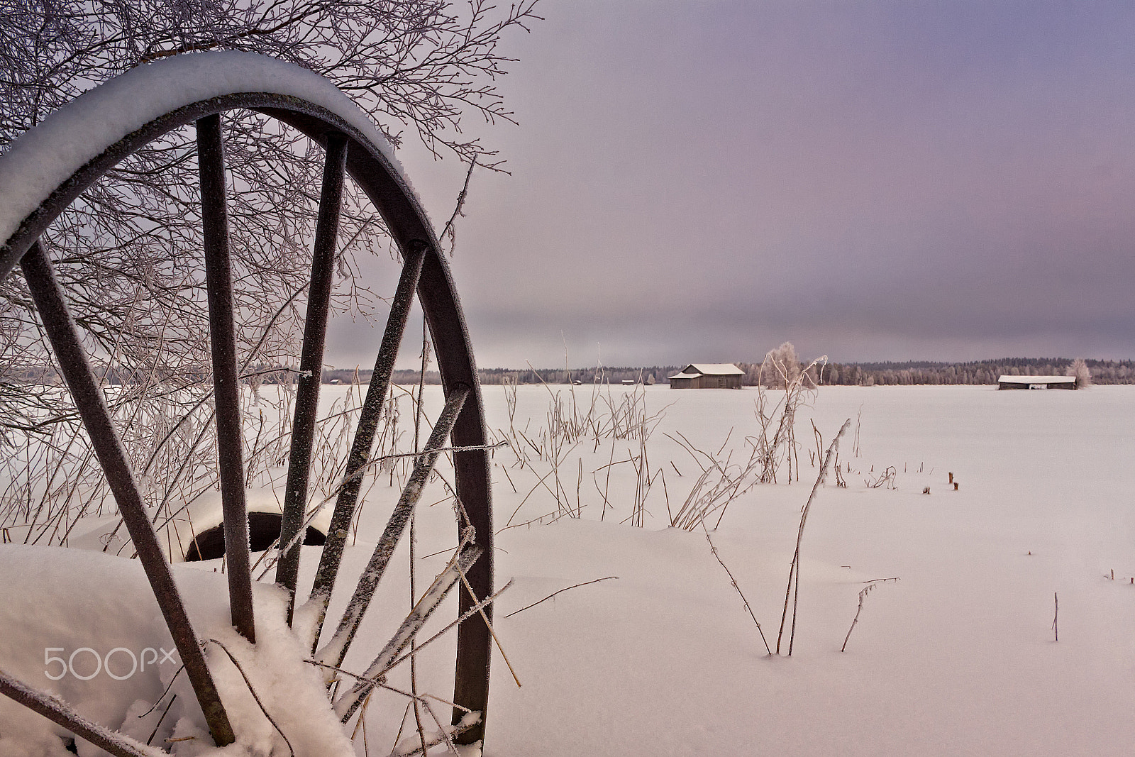 Canon EF-S 24mm F2.8 STM sample photo. Old snow covered harvester photography