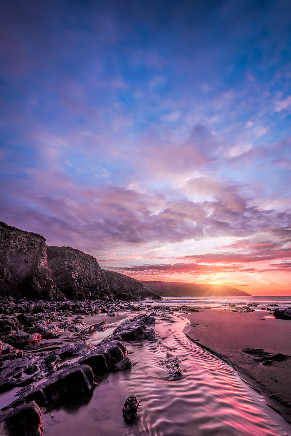 Nikon AF-S Nikkor 16-35mm F4G ED VR sample photo. Rocky bay vertical sunrise photography