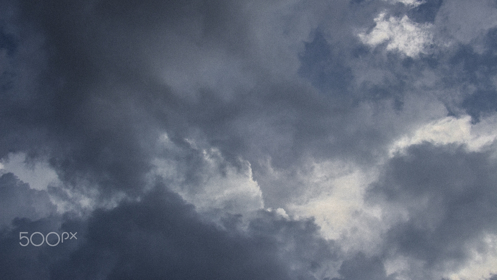 Canon EF-S 18-55mm F3.5-5.6 II sample photo. Stormy skies photography