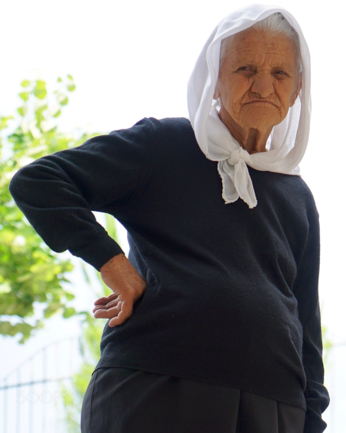 Sony a7S + Sony Vario Tessar T* FE 24-70mm F4 ZA OSS sample photo. Old woman in albania photography