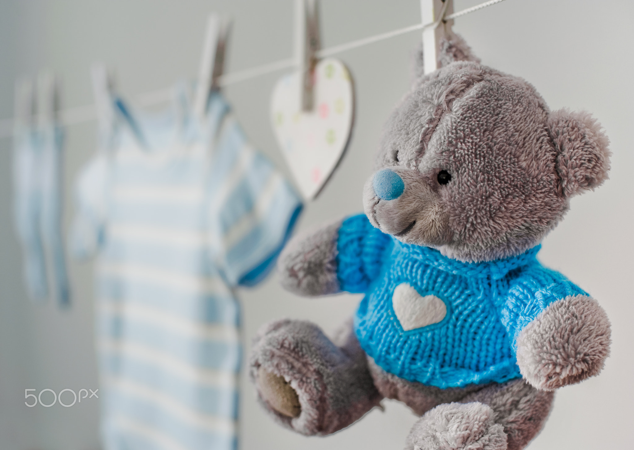 blue baby clothes on the clothesline