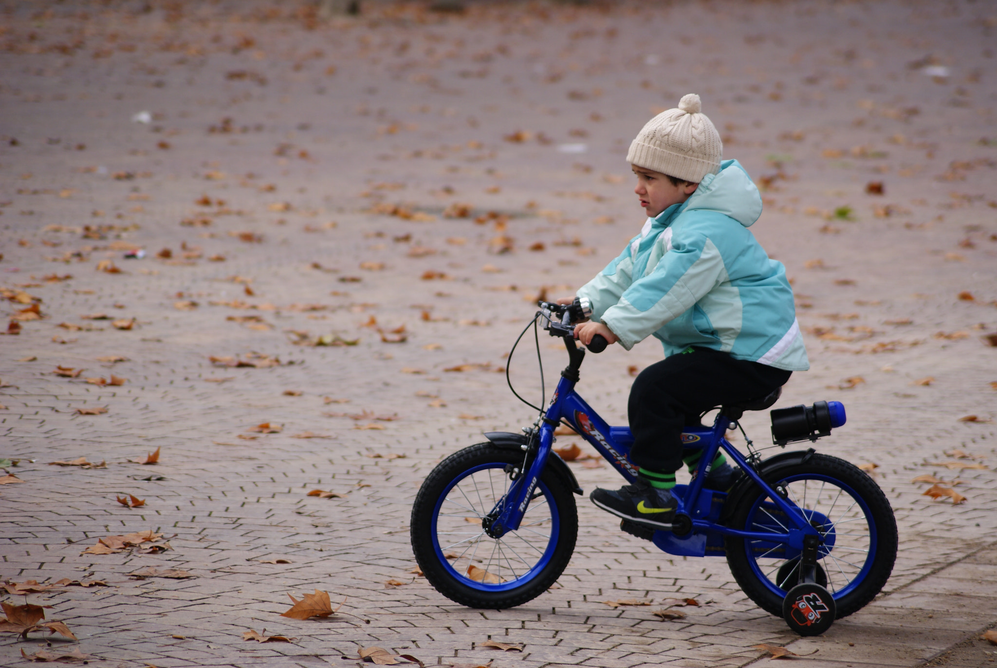 Sony Alpha DSLR-A230 sample photo. Nephew riding a bicycle photography