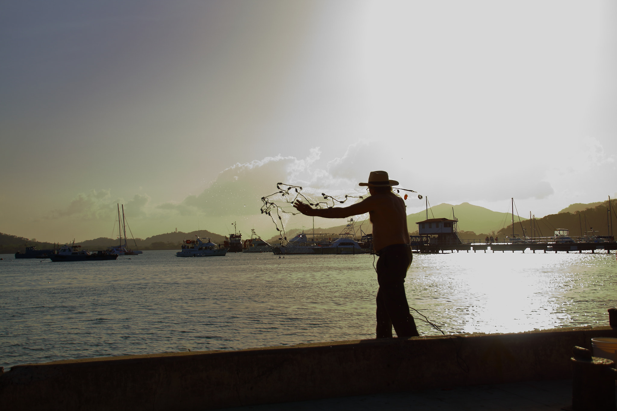 Canon EOS M10 sample photo. Fisherman photography