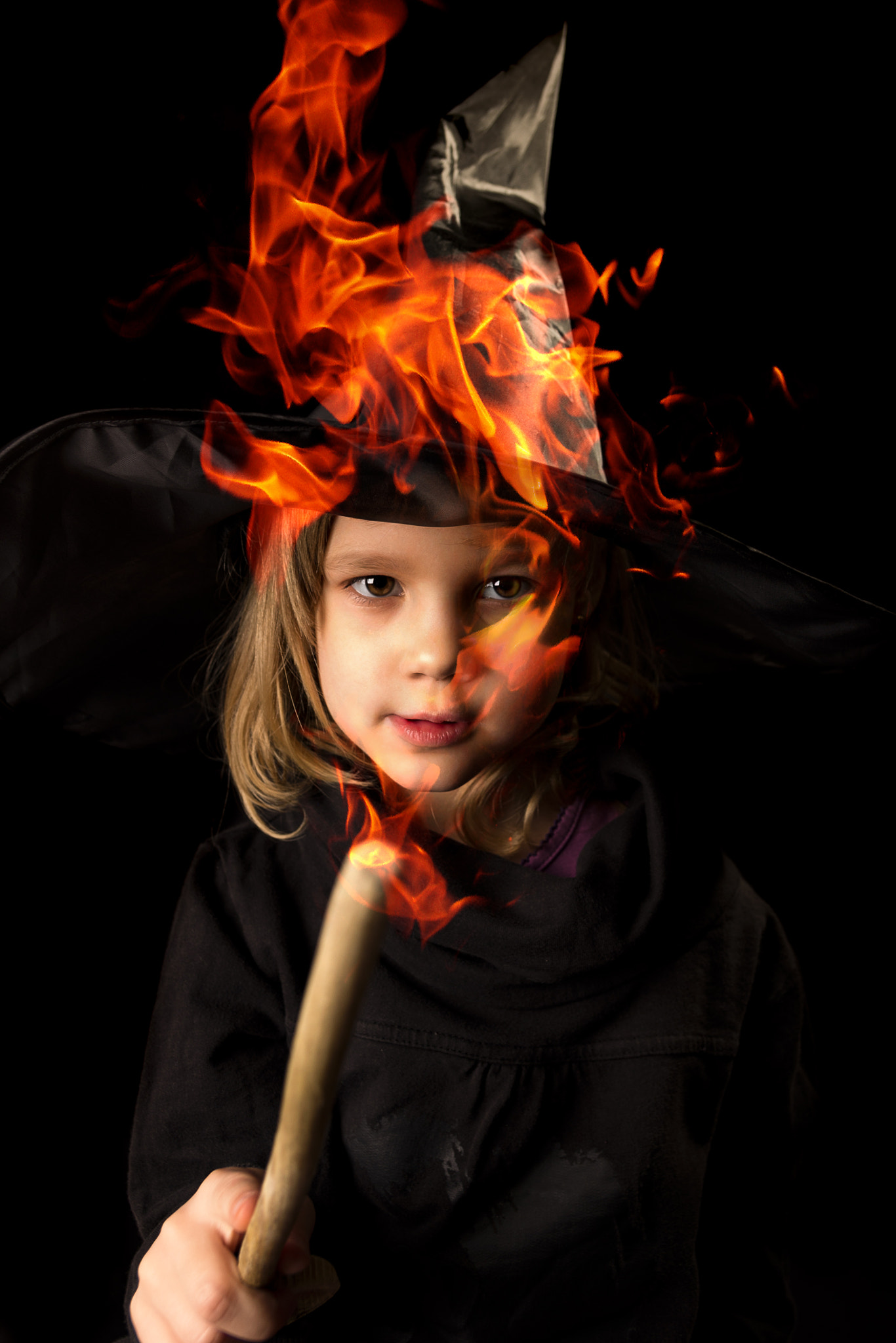 Pentax K-5 + Sigma 17-50mm F2.8 EX DC HSM sample photo. Funny little witch playing with fire photography