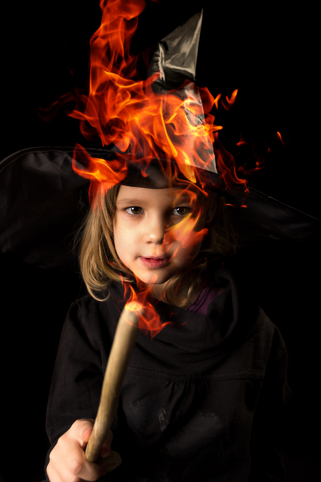 Sigma 17-50mm F2.8 EX DC HSM sample photo. Funny little witch playing with fire photography