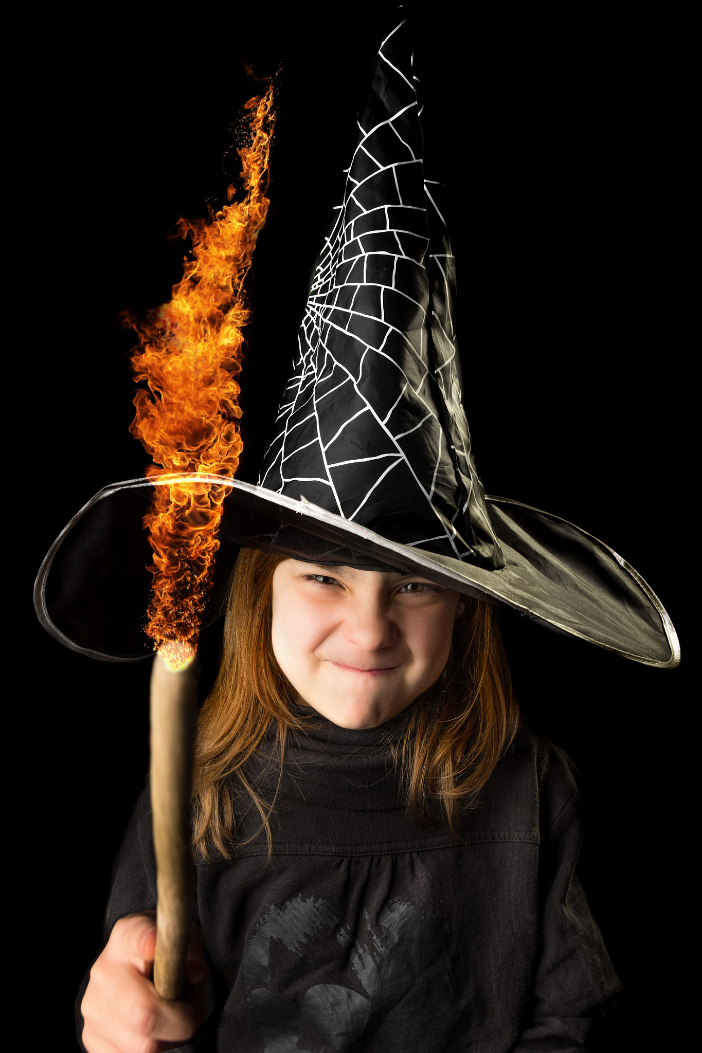 Pentax K-5 sample photo. Funny little witch playing with fire photography
