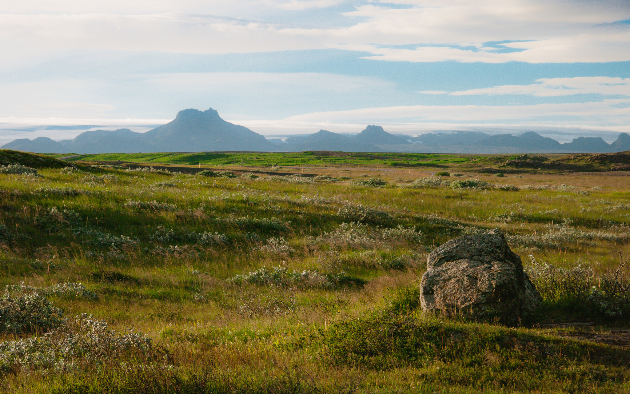 Pentax K20D sample photo. Peaceful icelandic plains with volcano in distance photography
