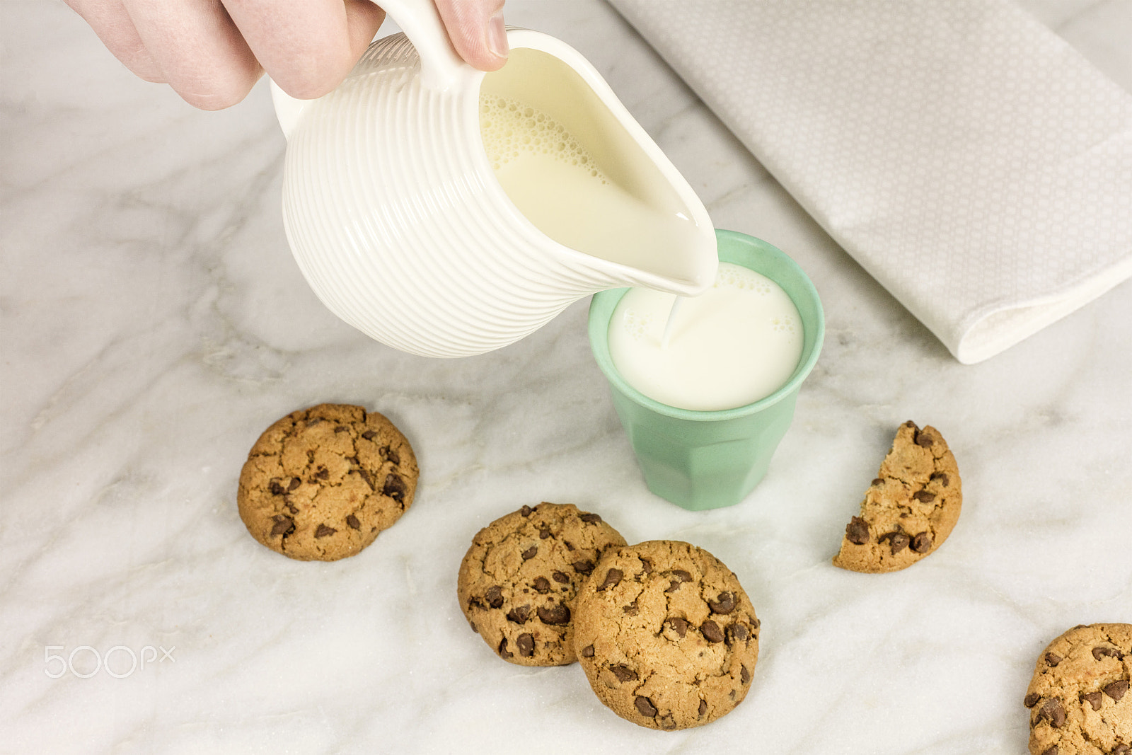 Canon EOS 5DS R sample photo. Milk poured into glass, with chocolate chips cookies photography