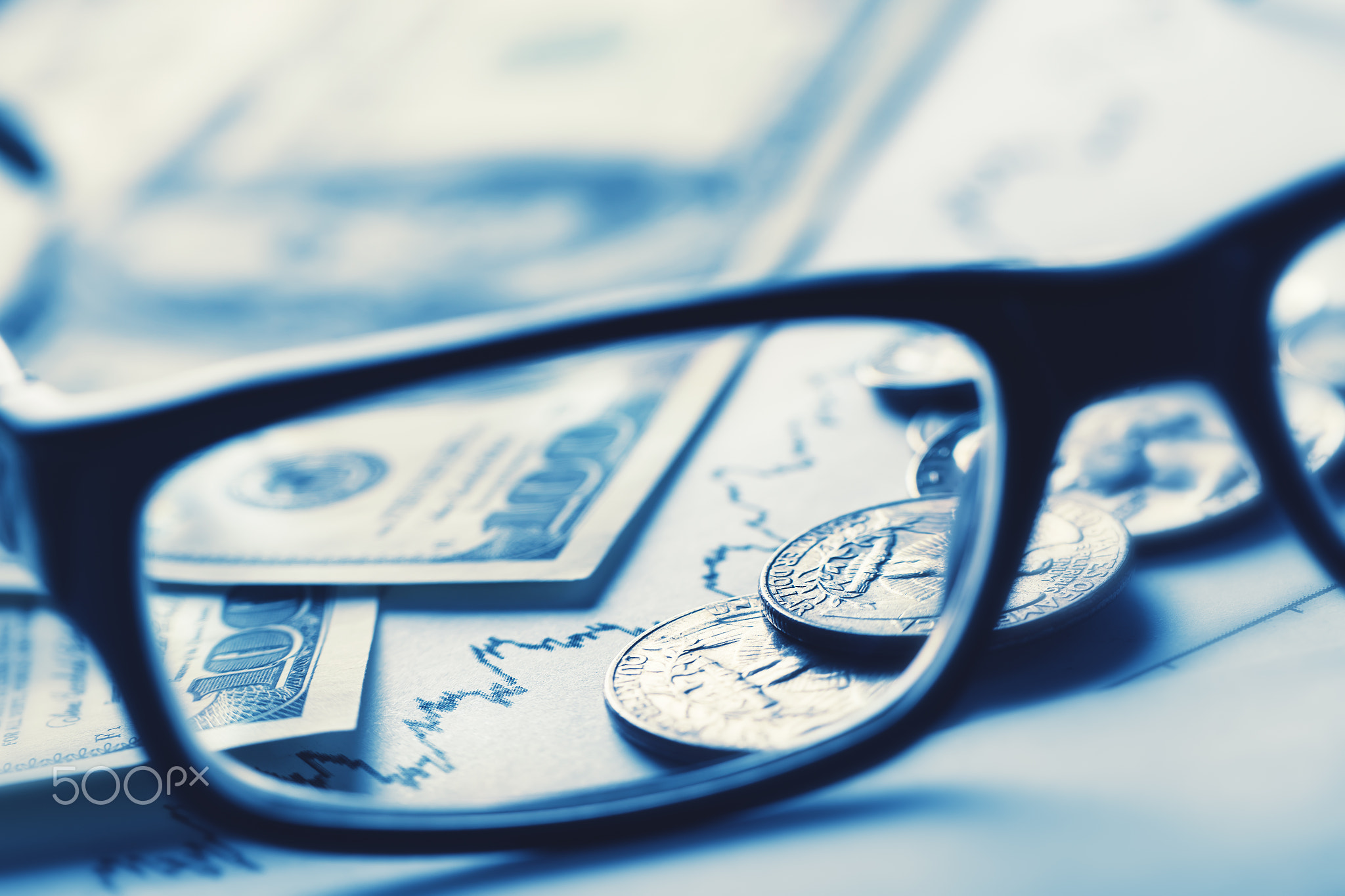 Business still-life with glasses dollars and schedule