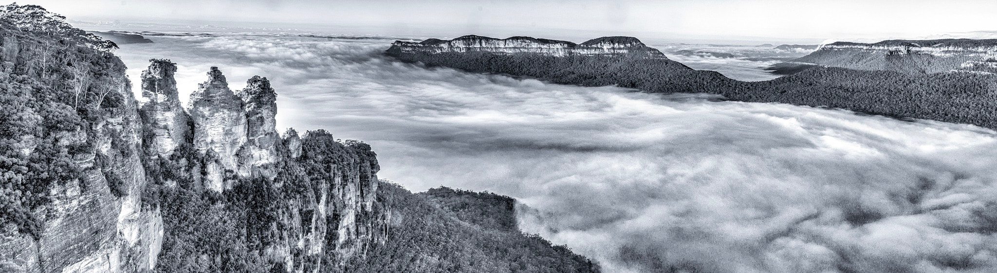 Sony Alpha NEX-7 + Sony E 18-200mm F3.5-6.3 OSS sample photo. The three sisters in the clouds - panorama photography