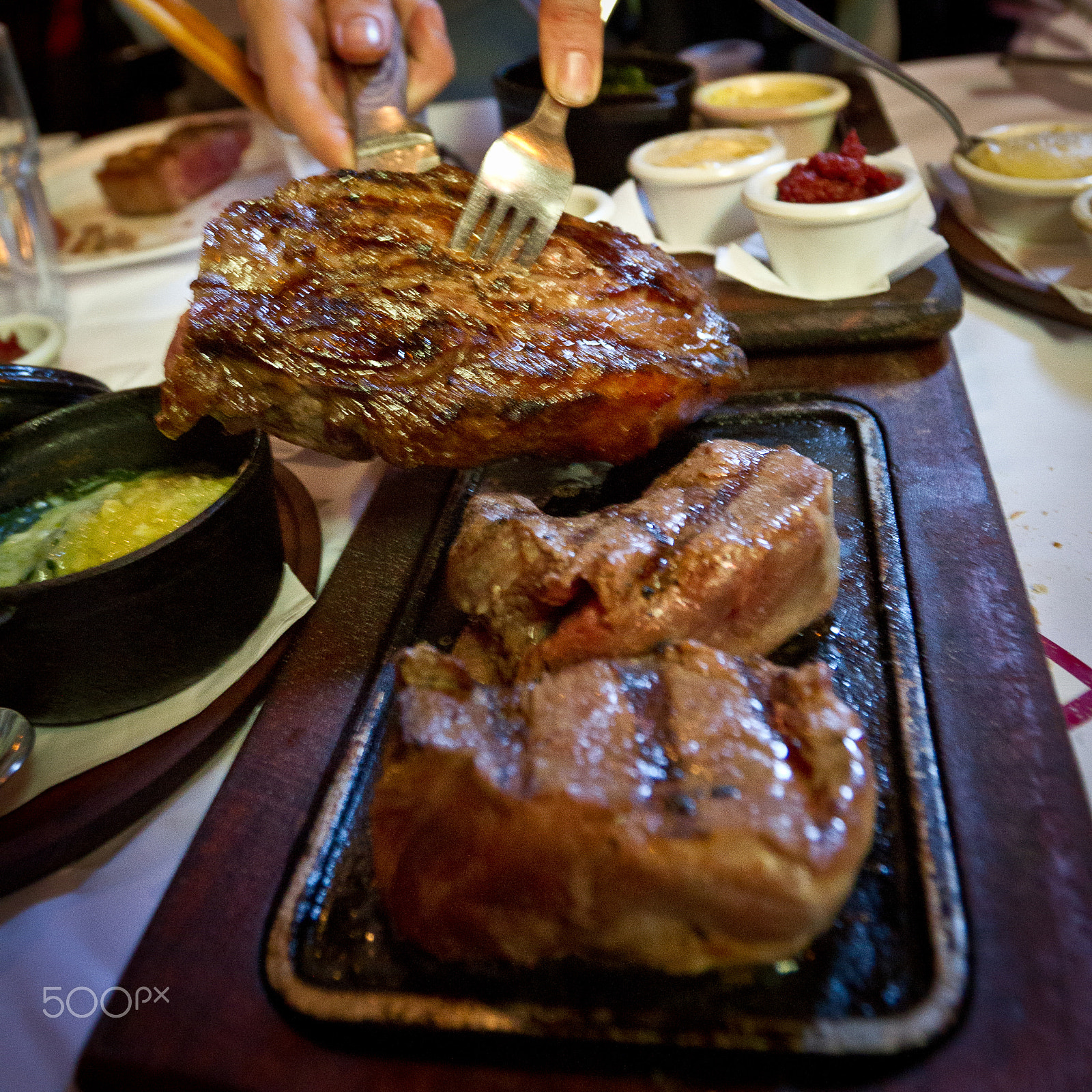 Canon EOS 7D + Canon EF 16-35mm F2.8L II USM sample photo. Thick juicy portions of grilled meat photography