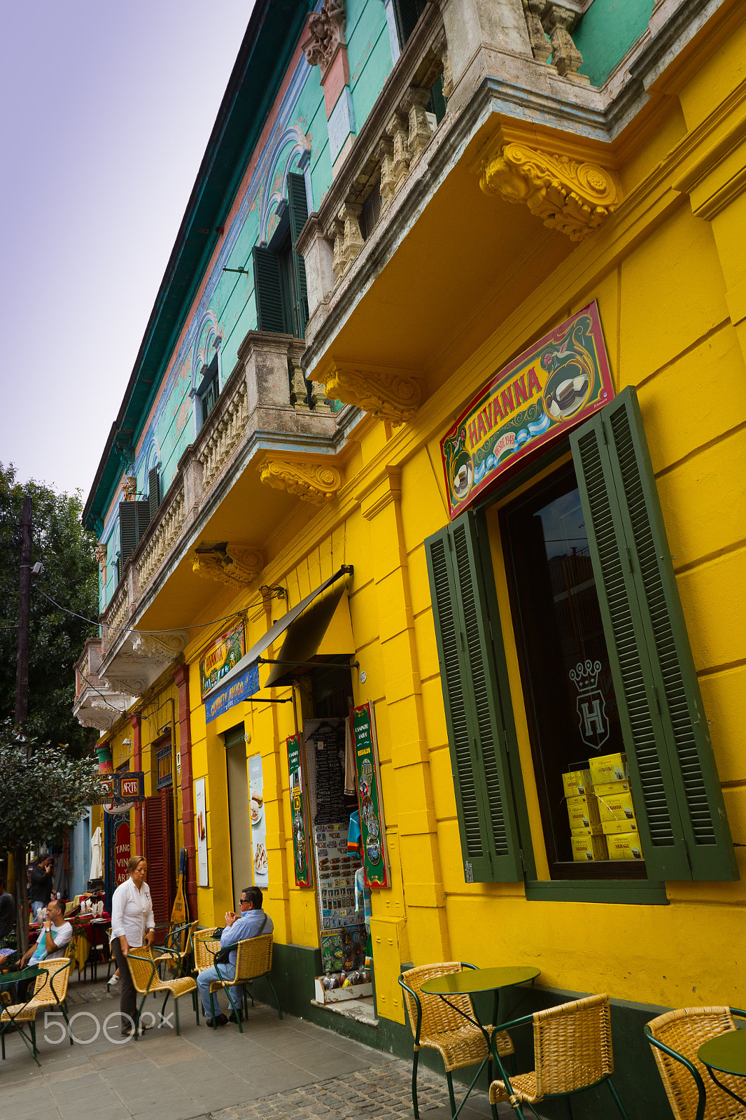 Canon EF 16-35mm F2.8L II USM sample photo. Bright yellow street restaurant or cafeteria photography