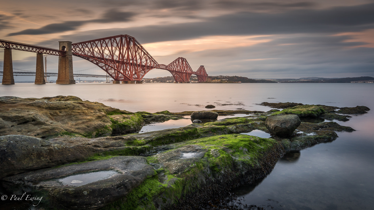 Canon EOS 7D Mark II sample photo. The forth bridge and some rocks photography